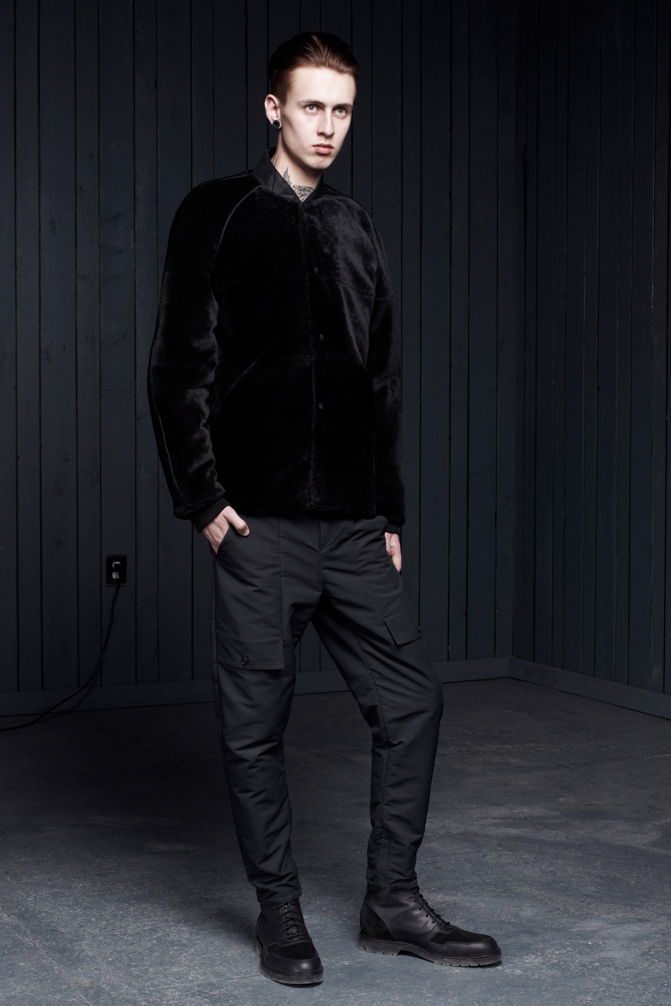 black faux-fur jacket with cargo pants