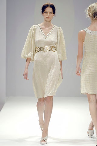 beige pleated dress with gold belt