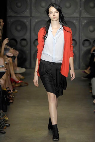 red cardigan white shirt black skirt