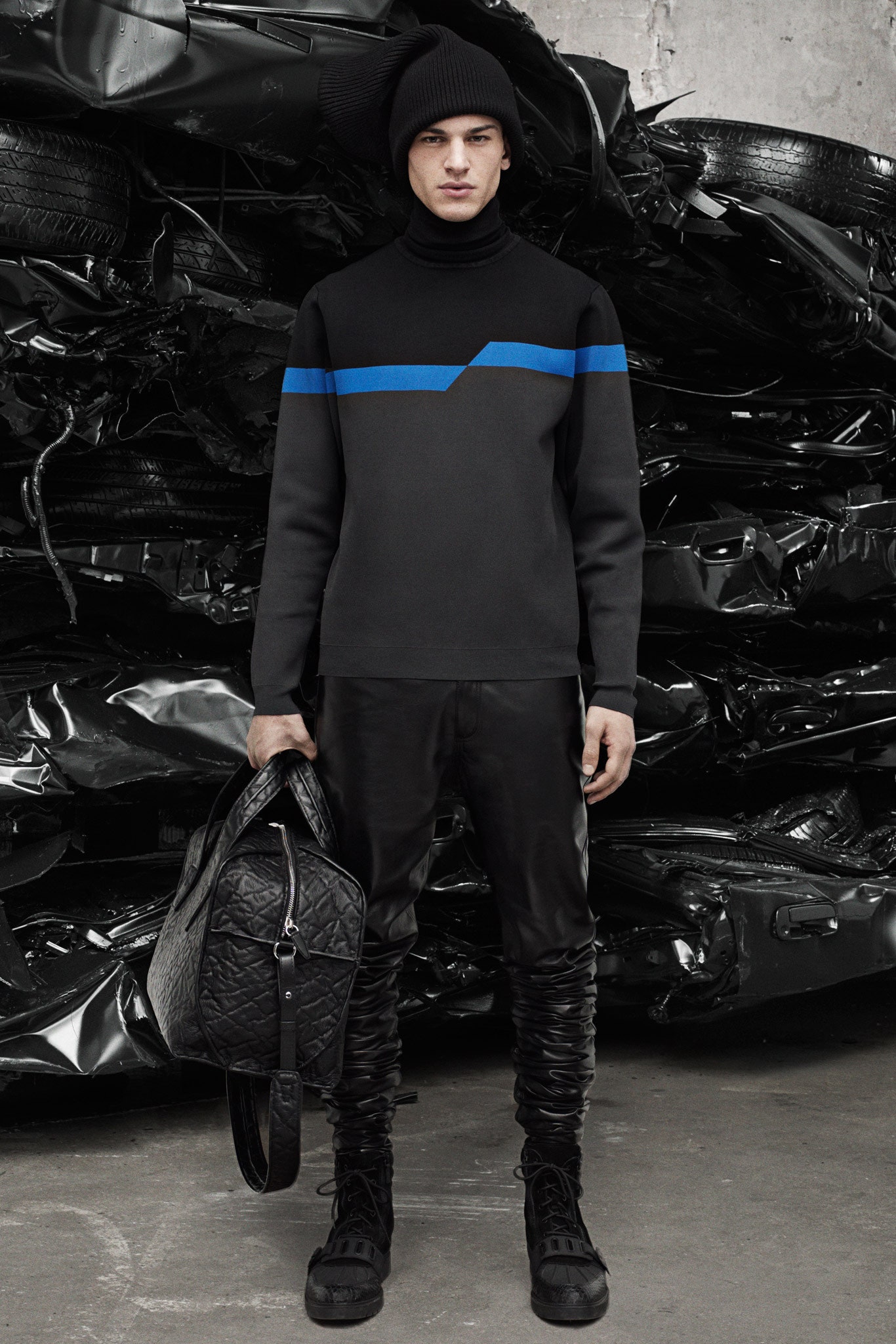 black fitted top with blue accents