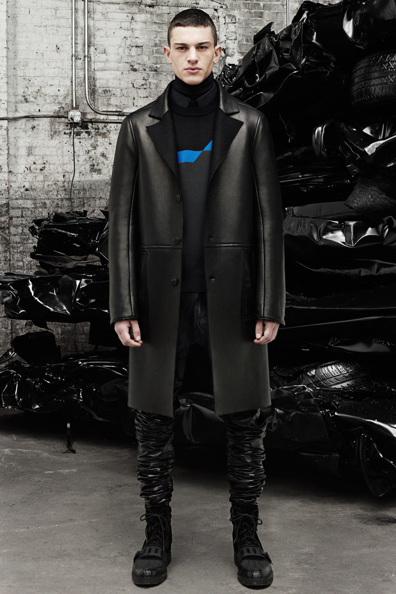 black leather coat and fitted outfit