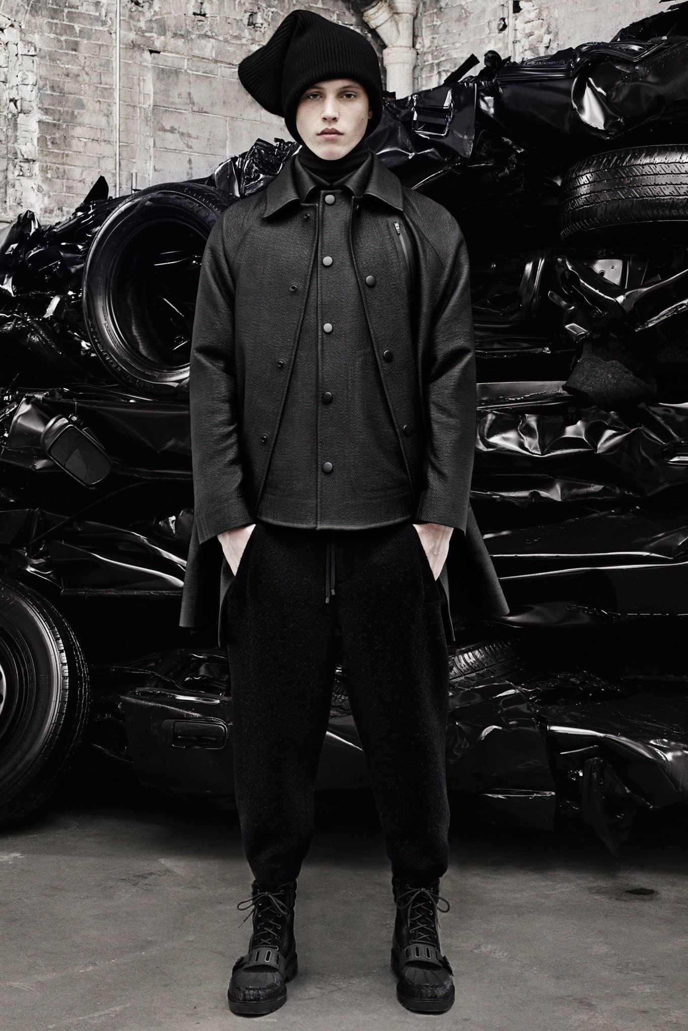 black leather fitted jacket and relaxed pants