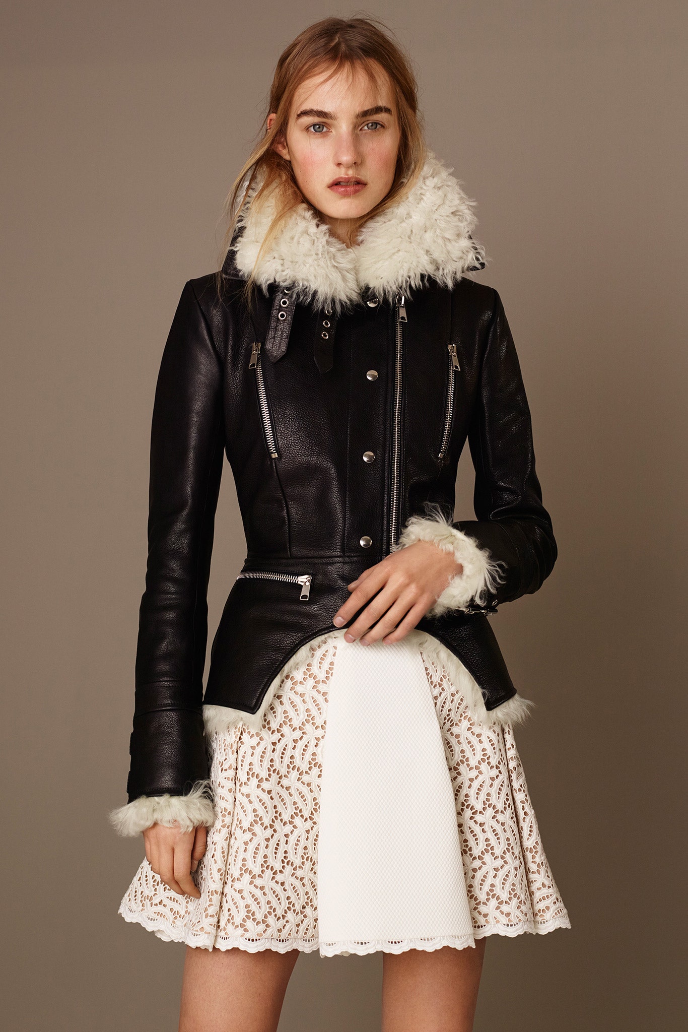black leather long-sleeve collared fitted zippered pockets jacket