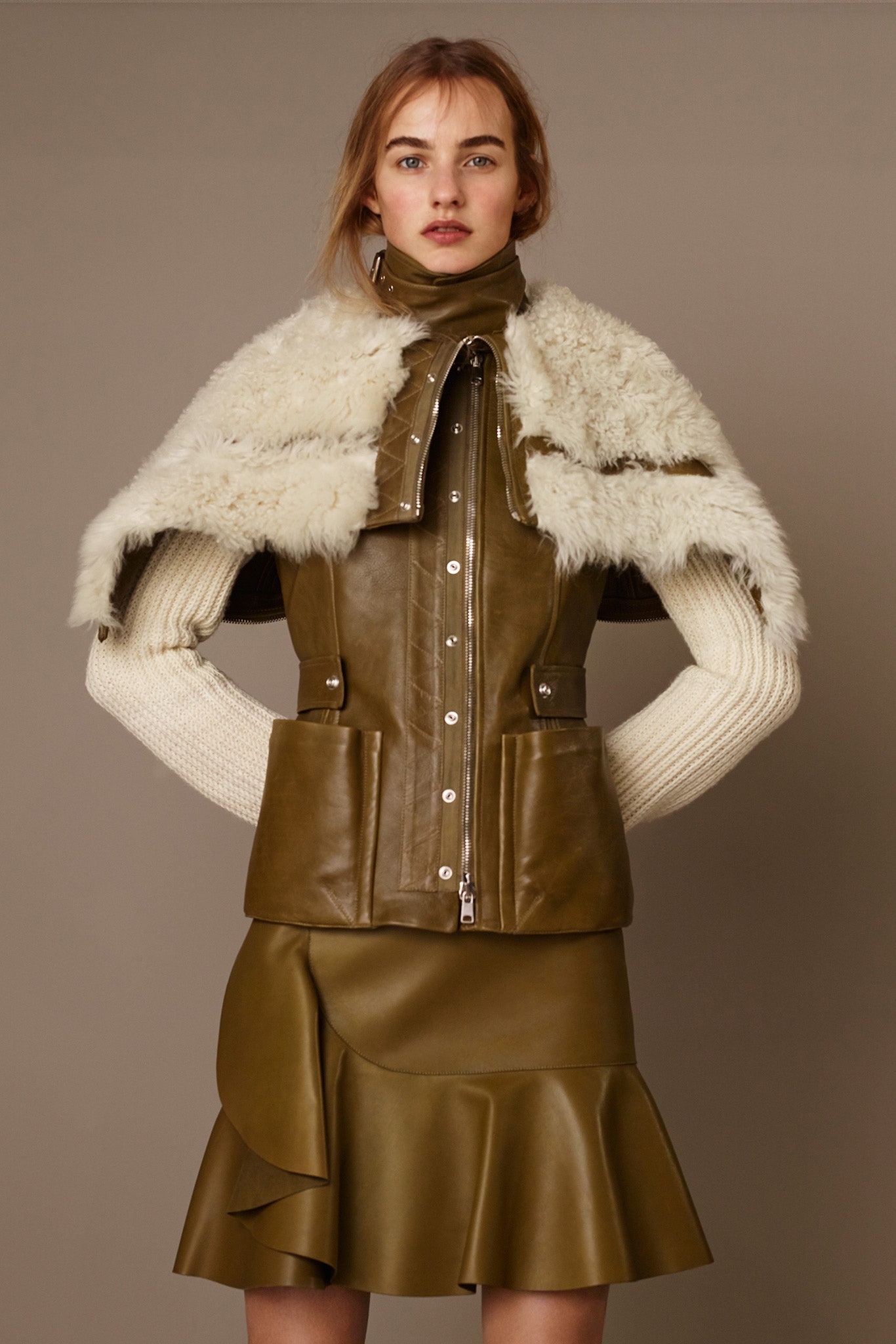 green leather long-sleeve collared fitted zippered pockets jacket