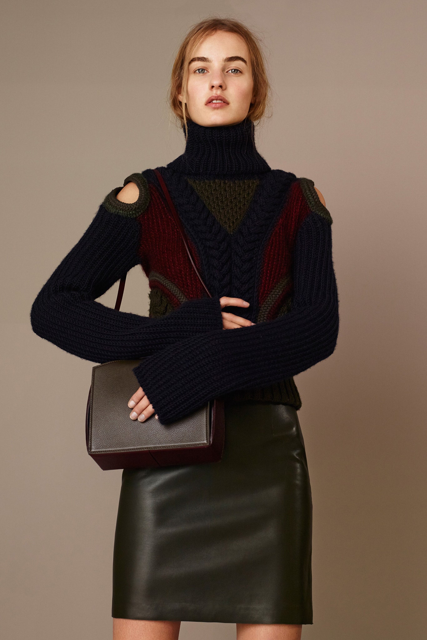 black wool sweater and leather skirt