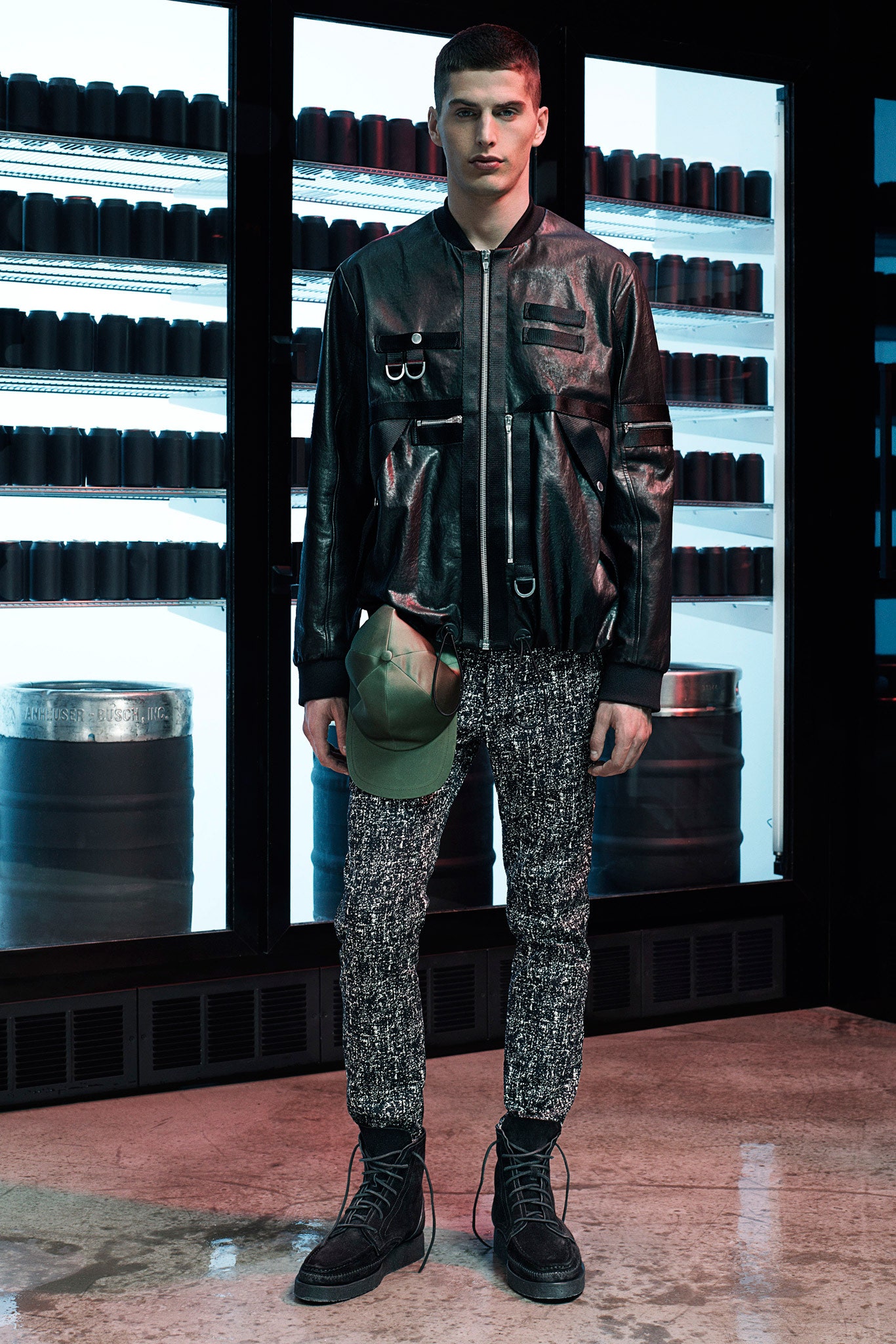 black leather jacket with gray pants