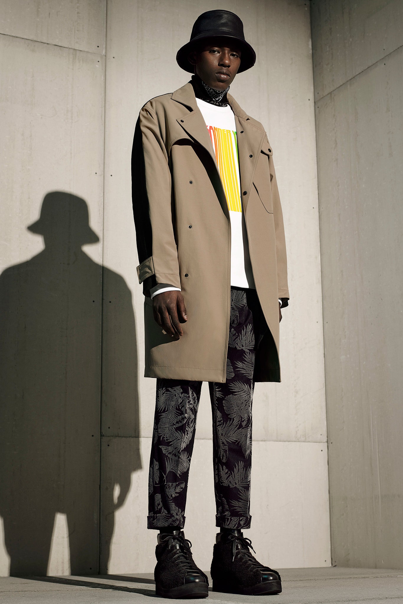 beige coat with printed shirt