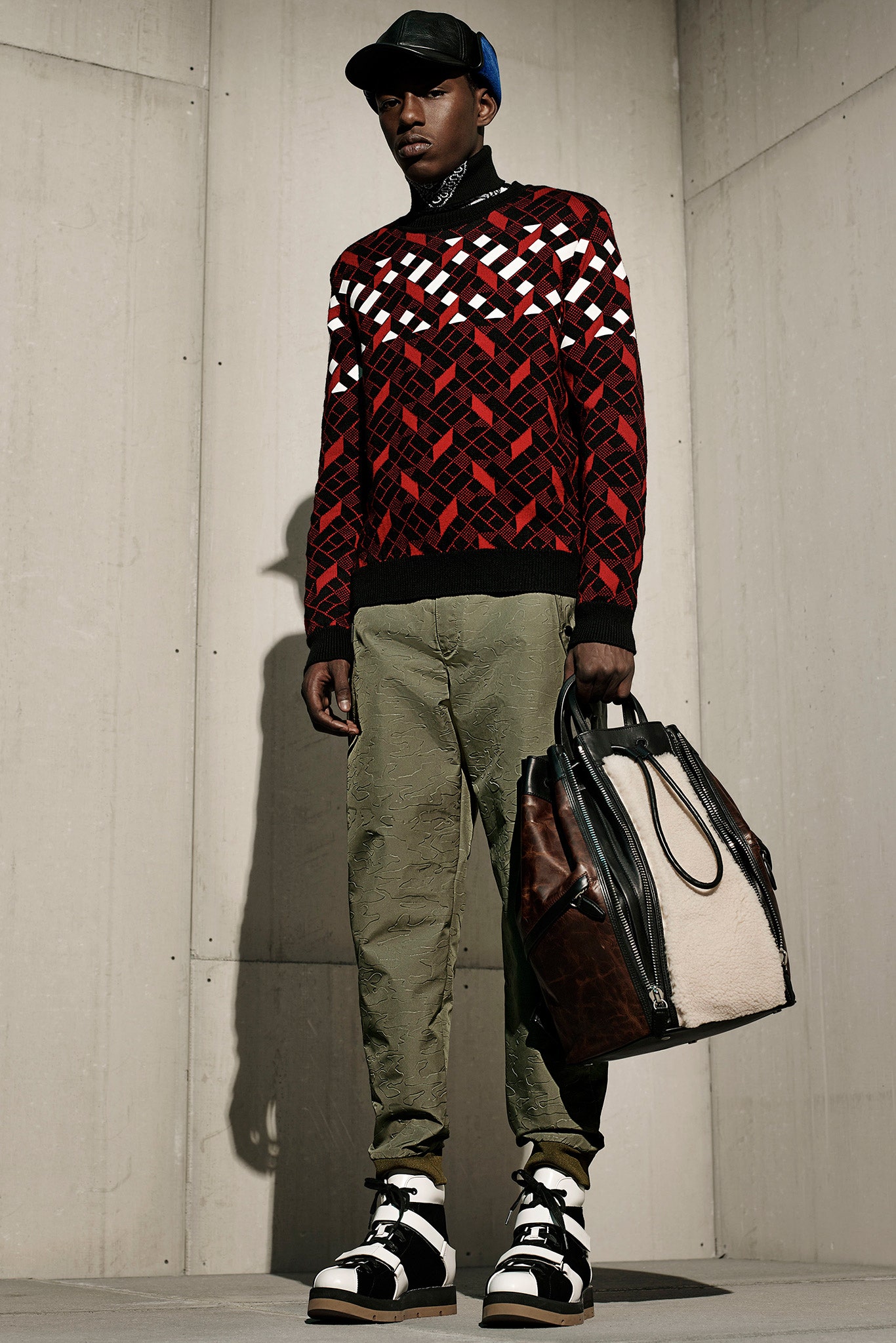 red printed sweater with cargo pants