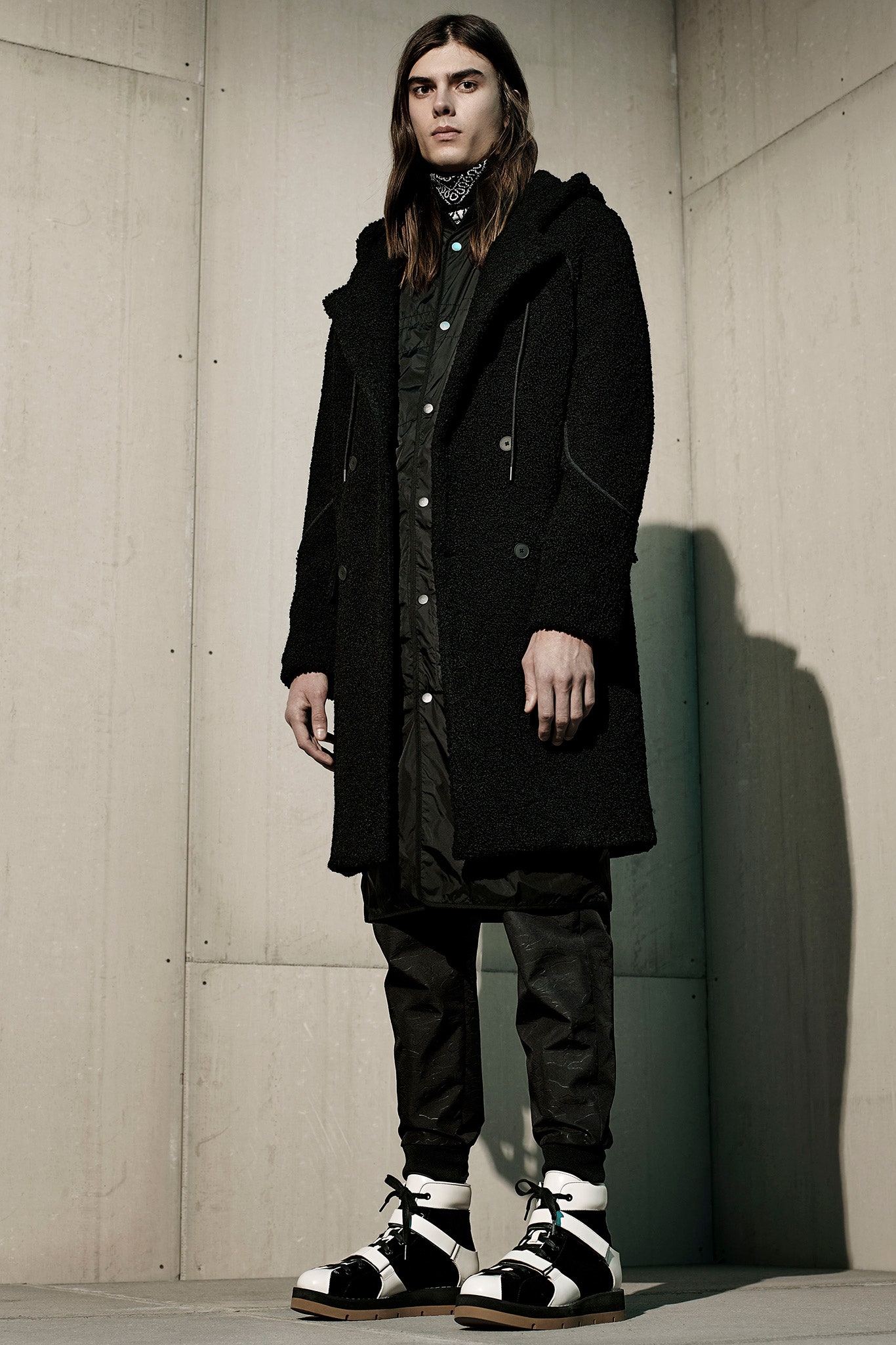 black wool coat with cargo pants