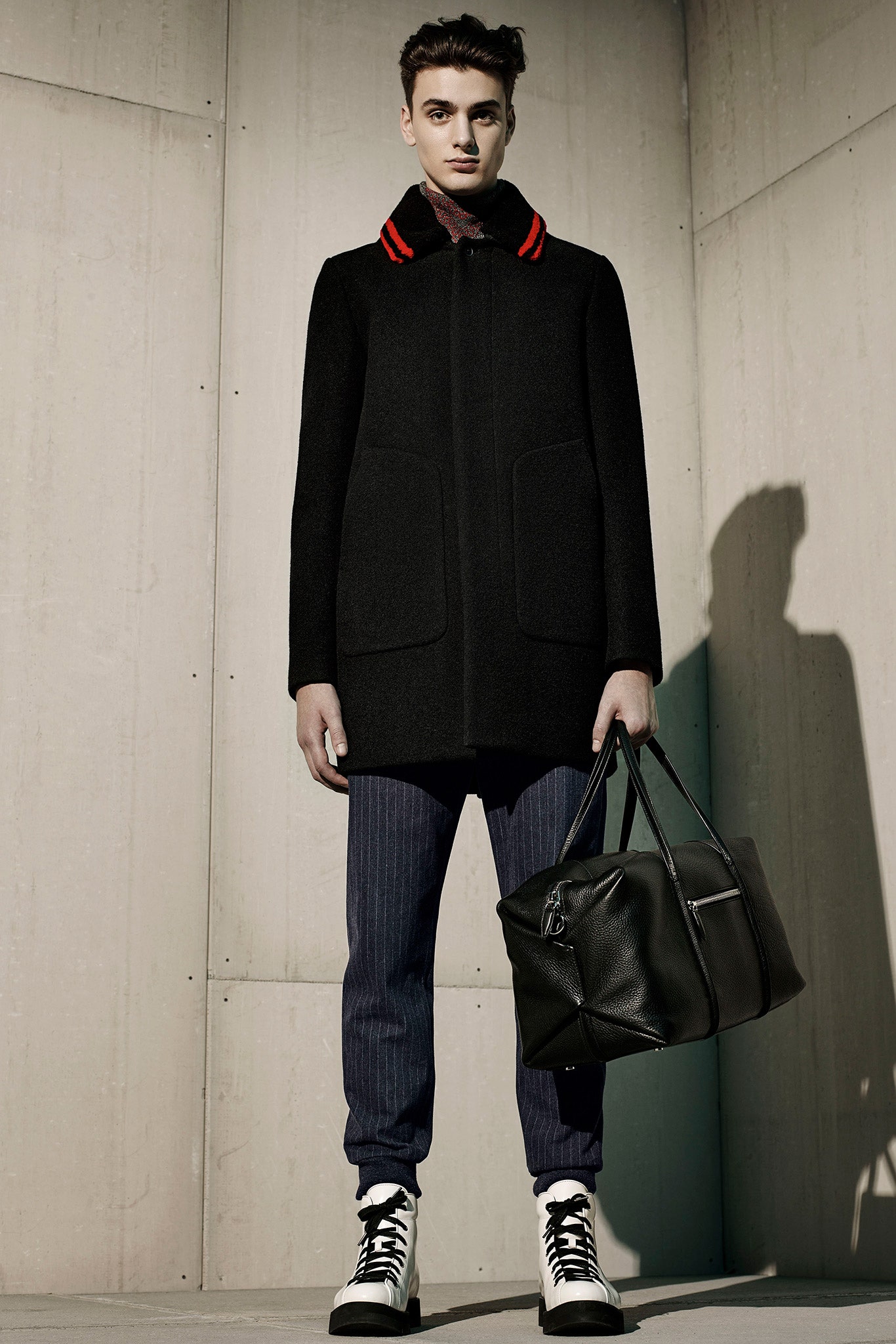 black wool coat with tailored pants