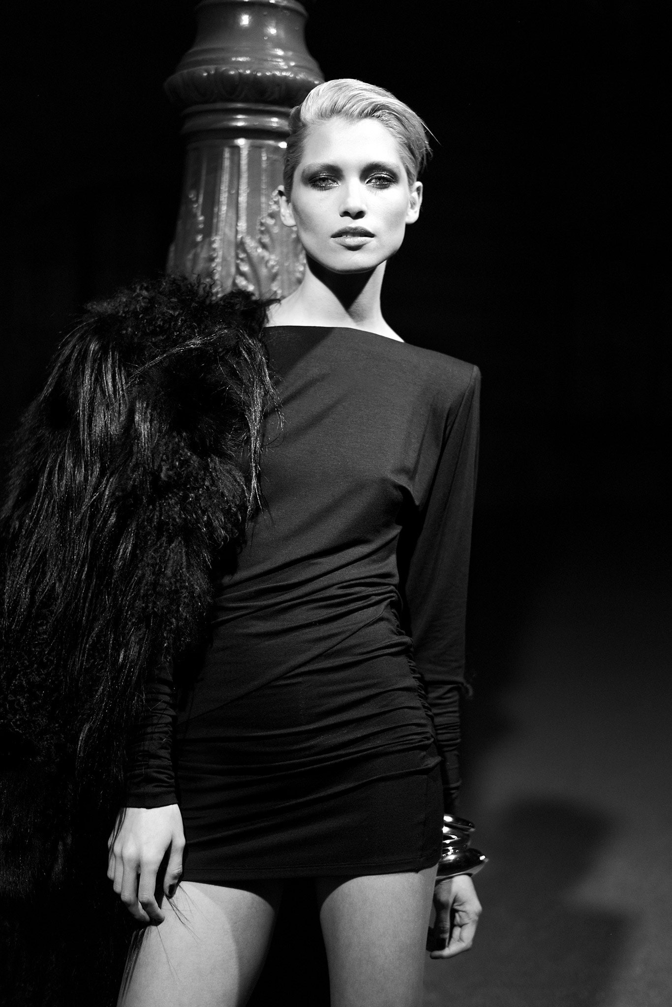 black fitted mini dress with cape