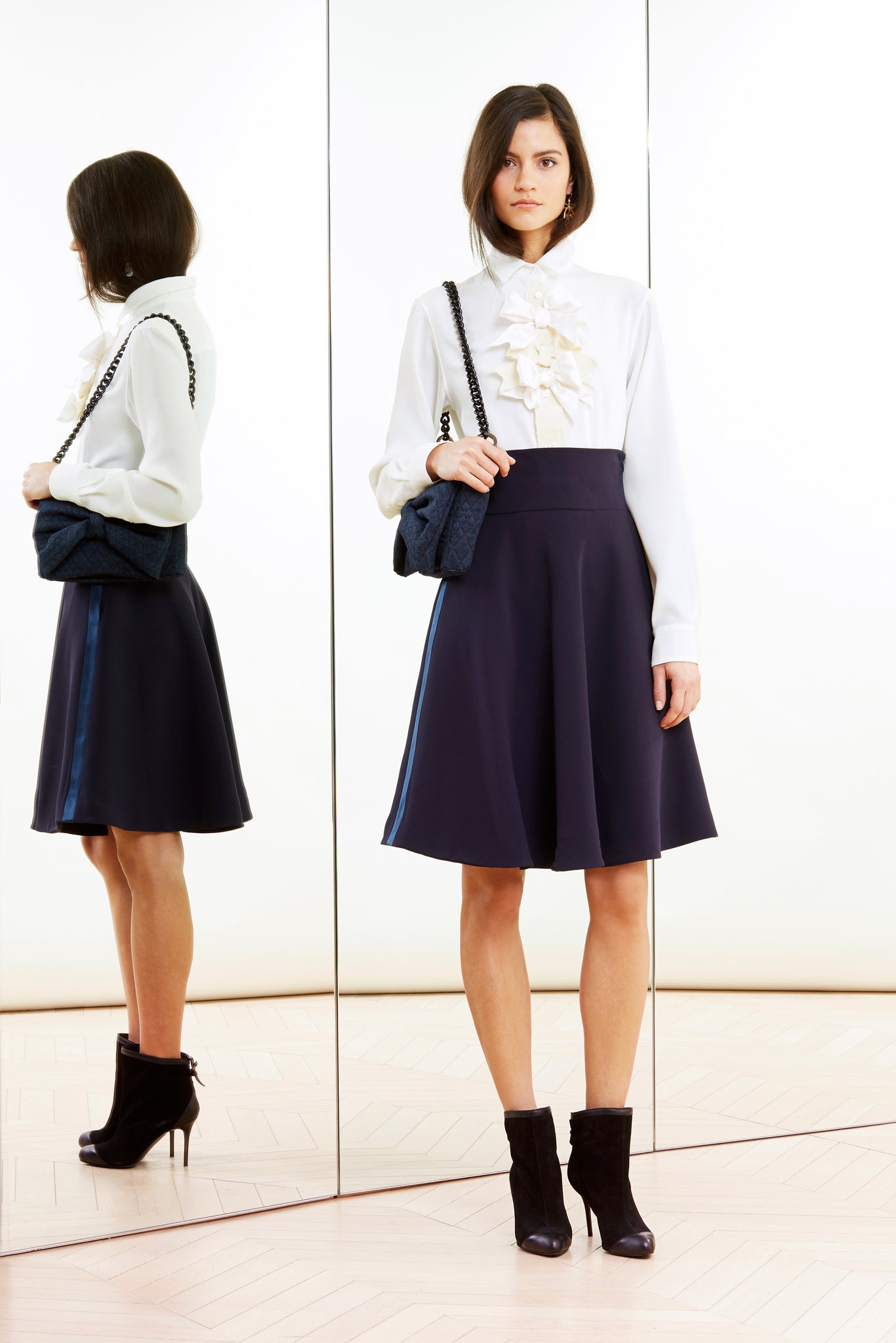 white cotton long-sleeve collared fitted ruffled blouse