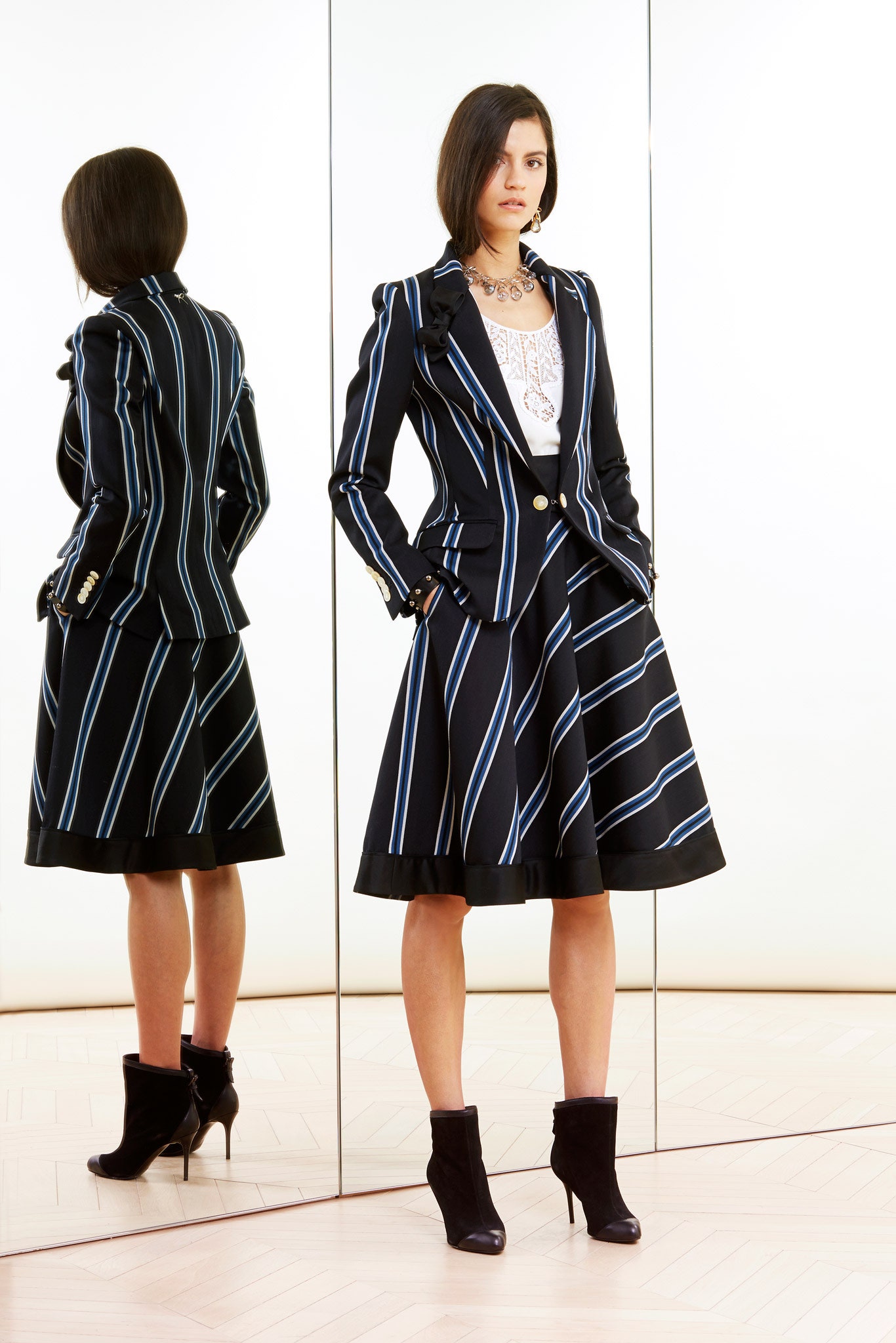 tailored black blazer with a-line skirt