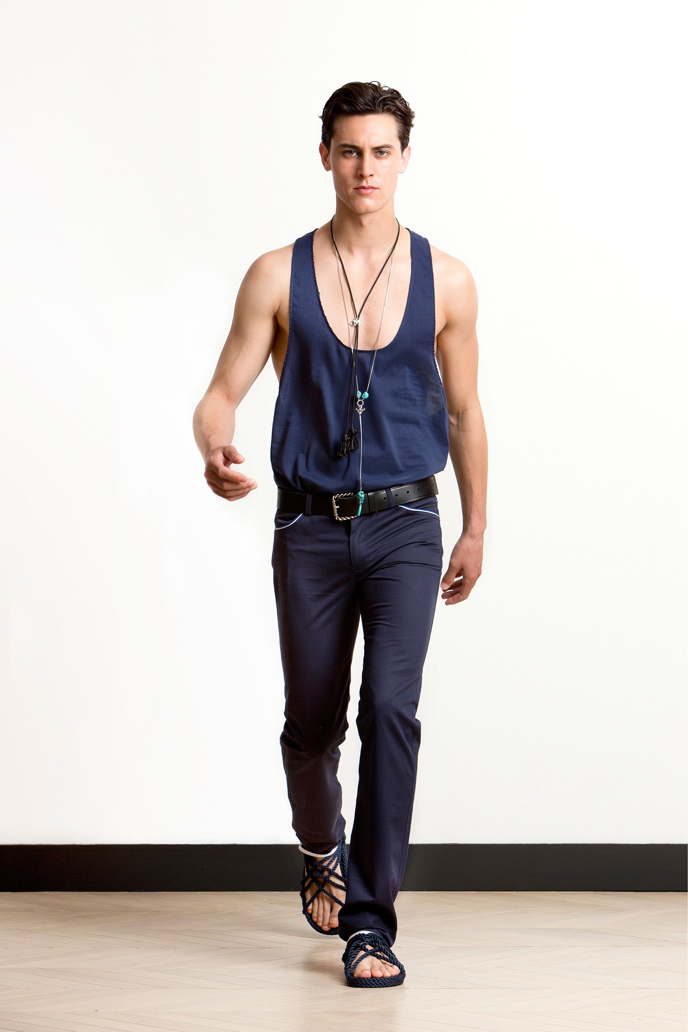 blue tank-top and navy pants