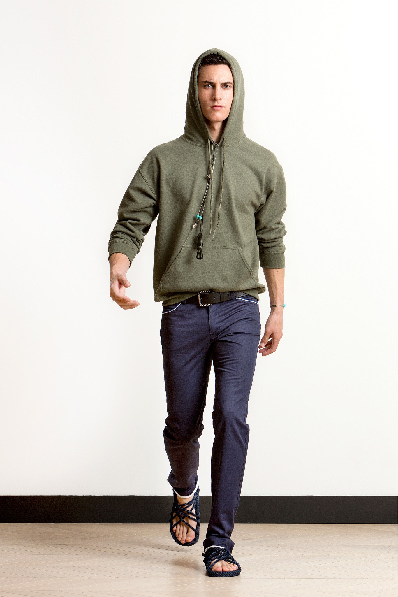 green hoodie with blue pants