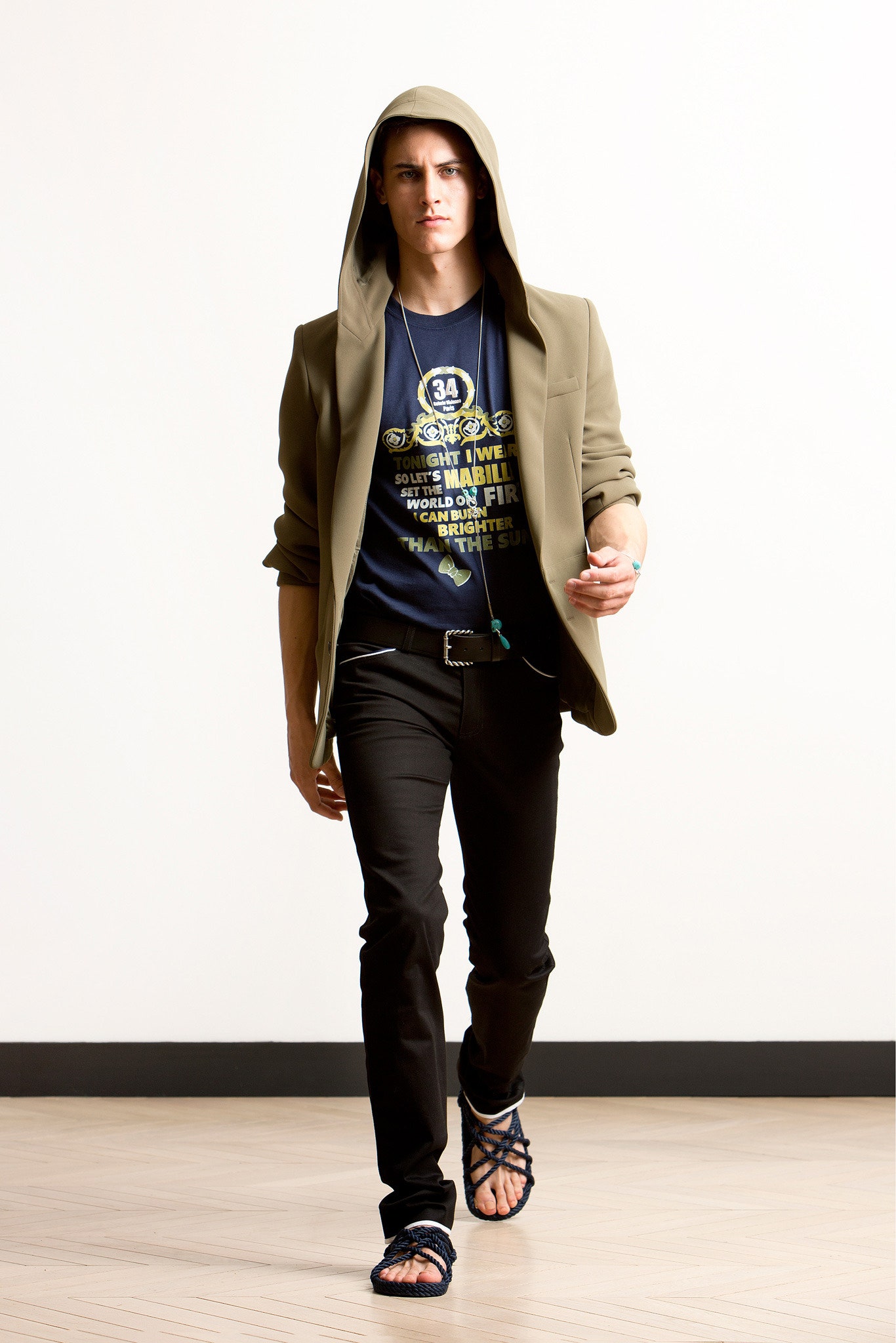 beige structured jacket with black t-shirt