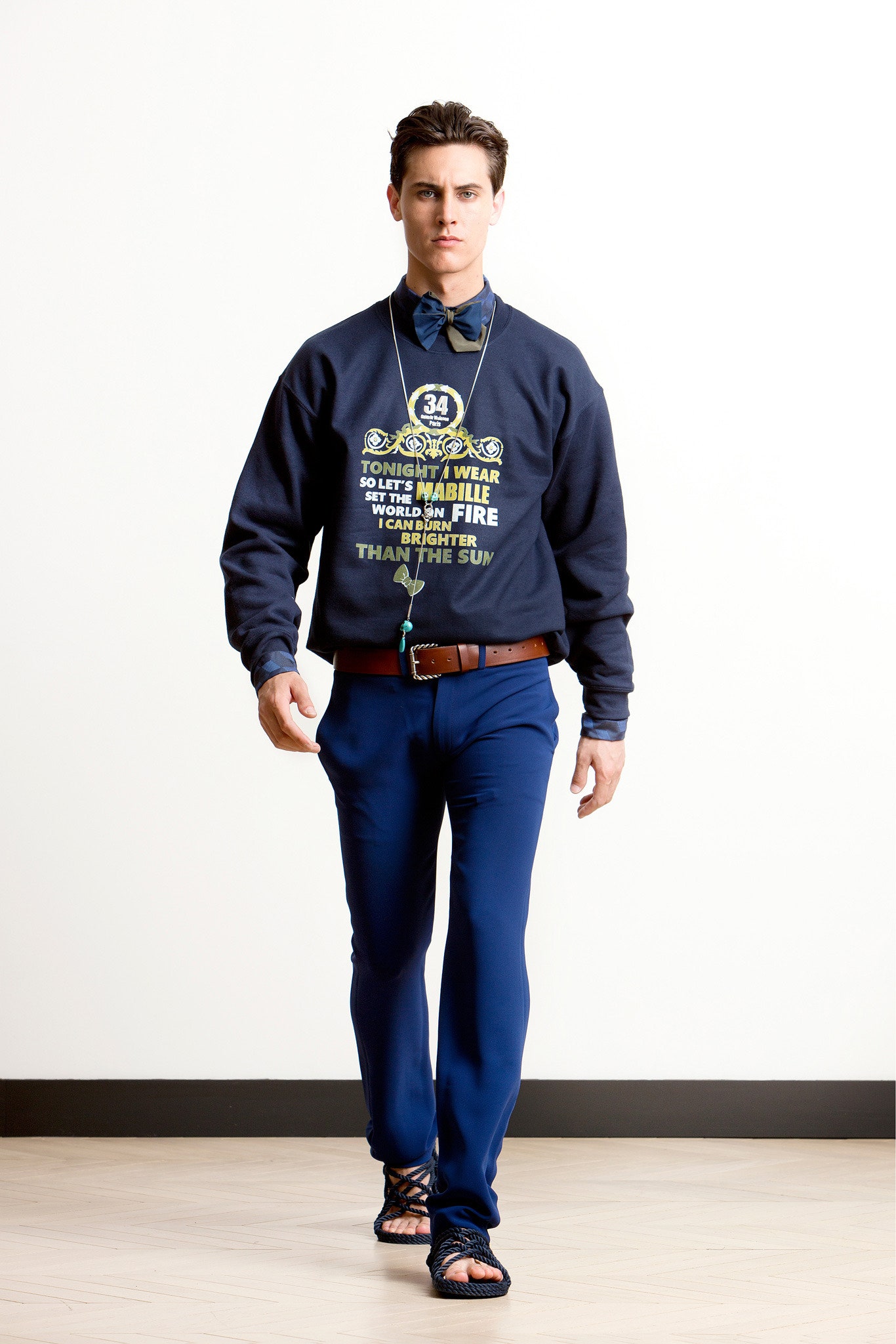 navy sweater with tailored pants
