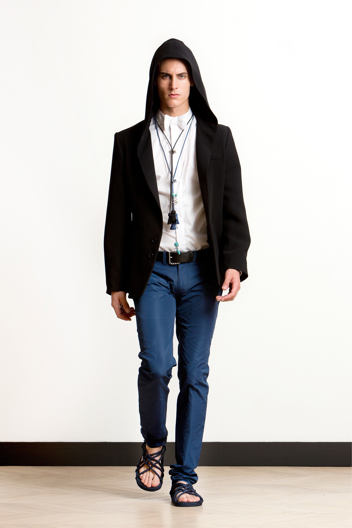 black jacket white shirt blue pants