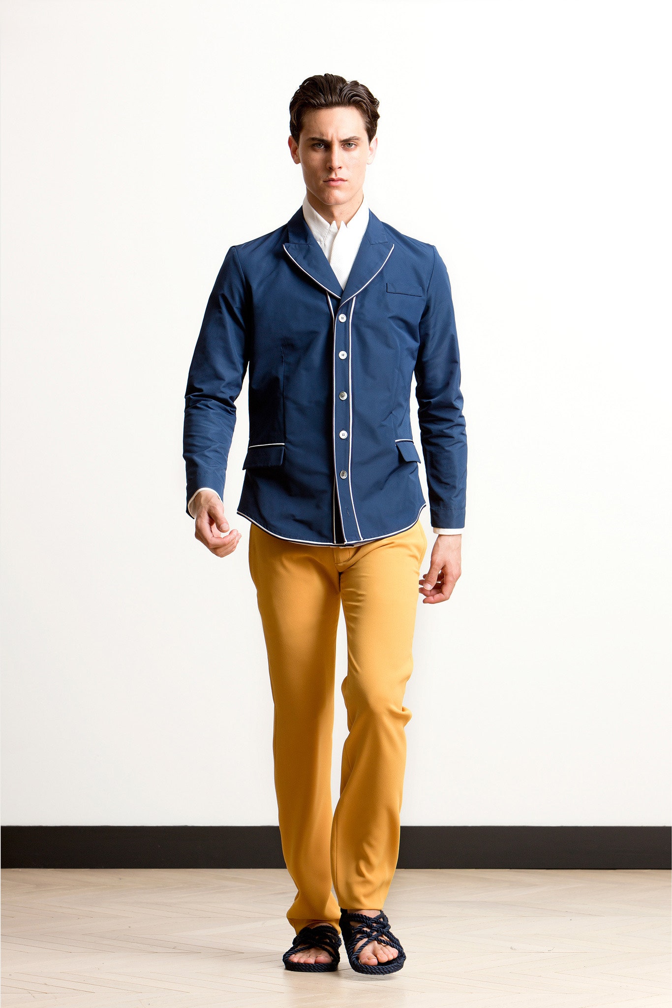 blue fitted jacket and yellow pants