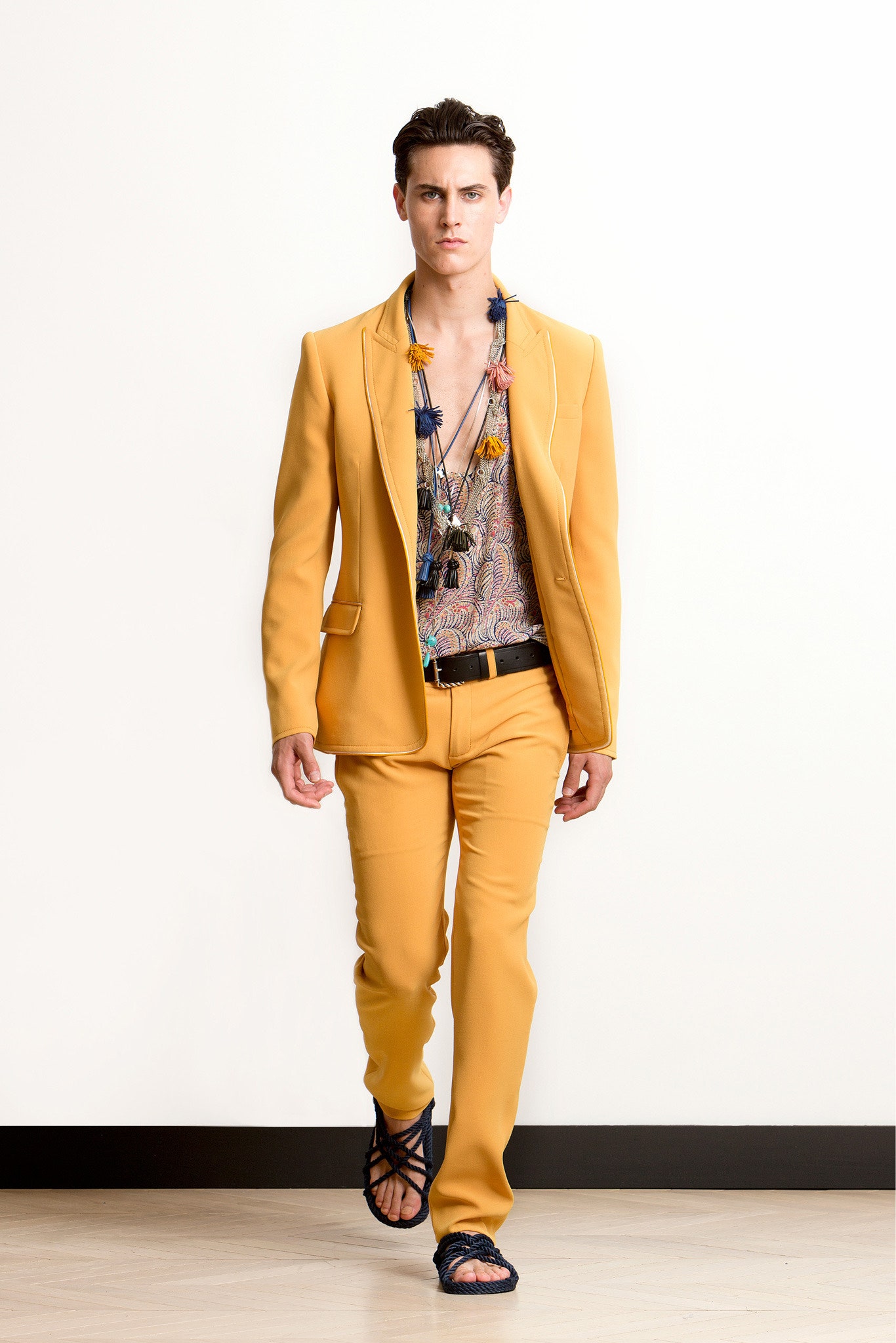 yellow tailored suit with printed shirt