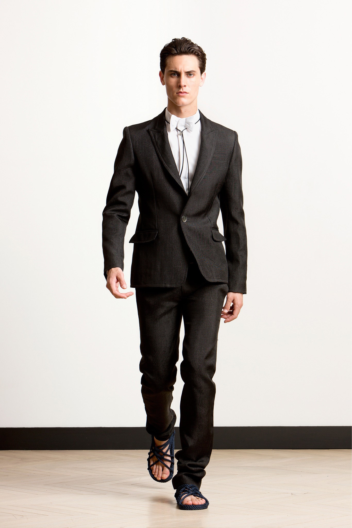 black tailored suit with white shirt