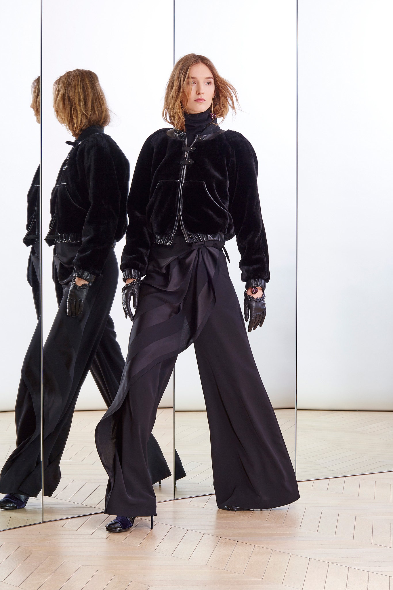 black velvet jacket with wide-leg pants