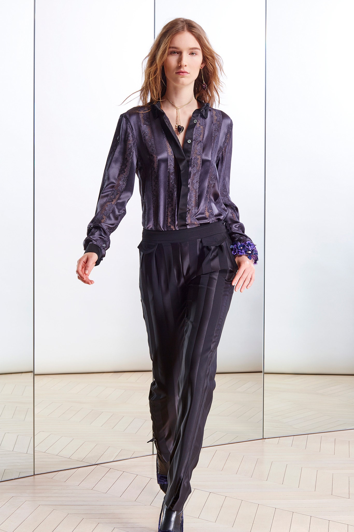 purple silk blouse and black tailored pants