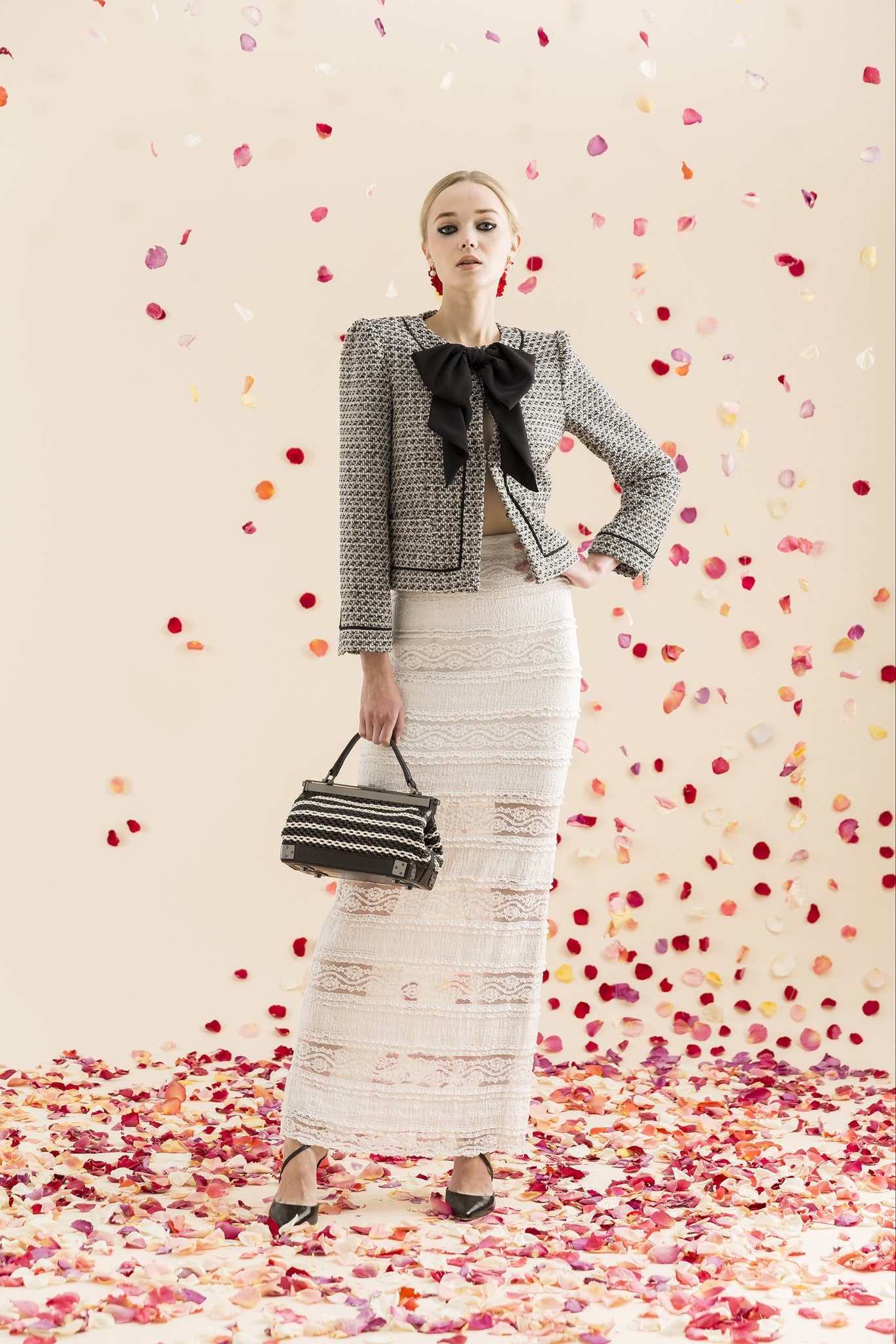 tailored black and white jacket with lace skirt
