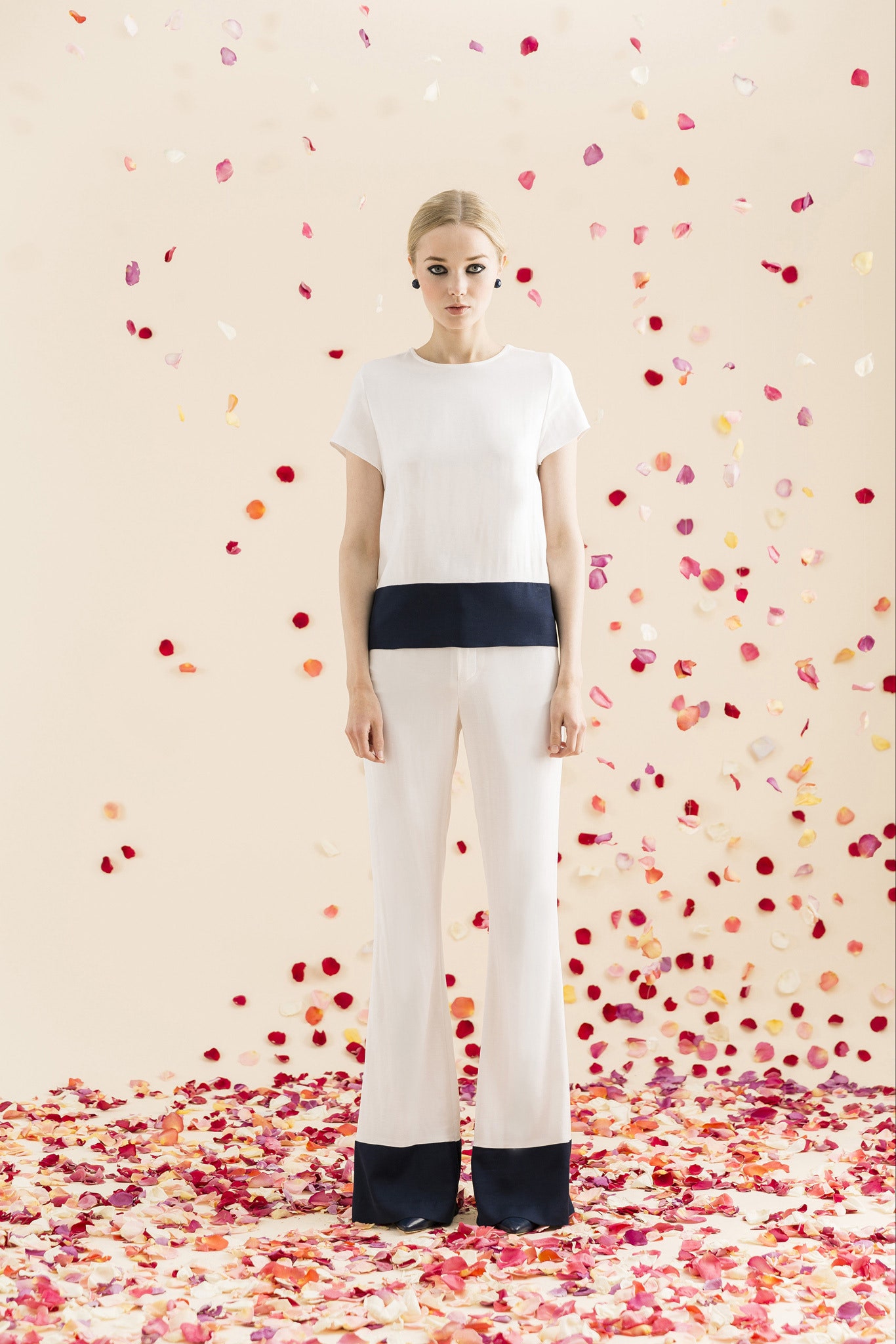 white silk fitted top and pants