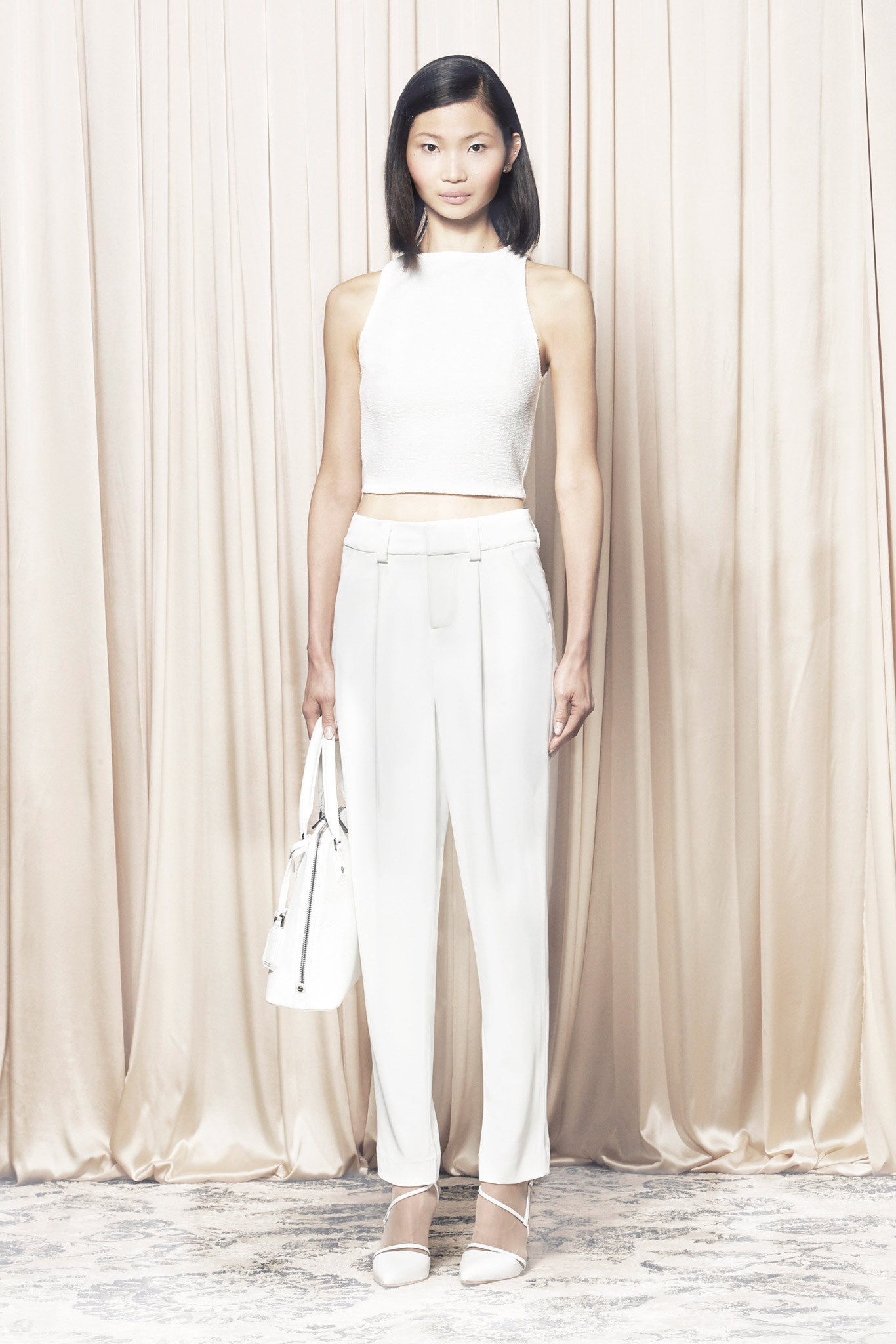 white fitted top and tailored pants