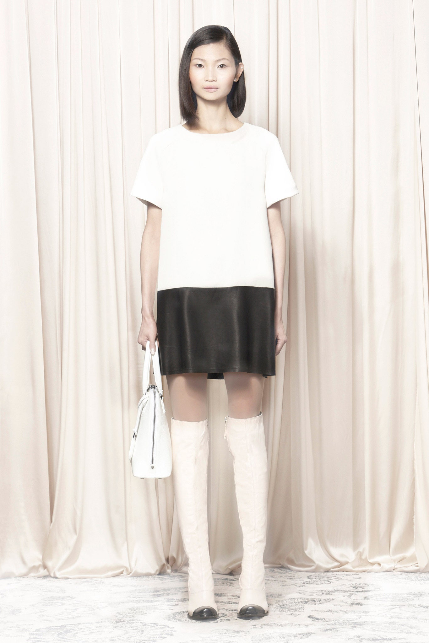 color-blocked mini dress with knee-high boots