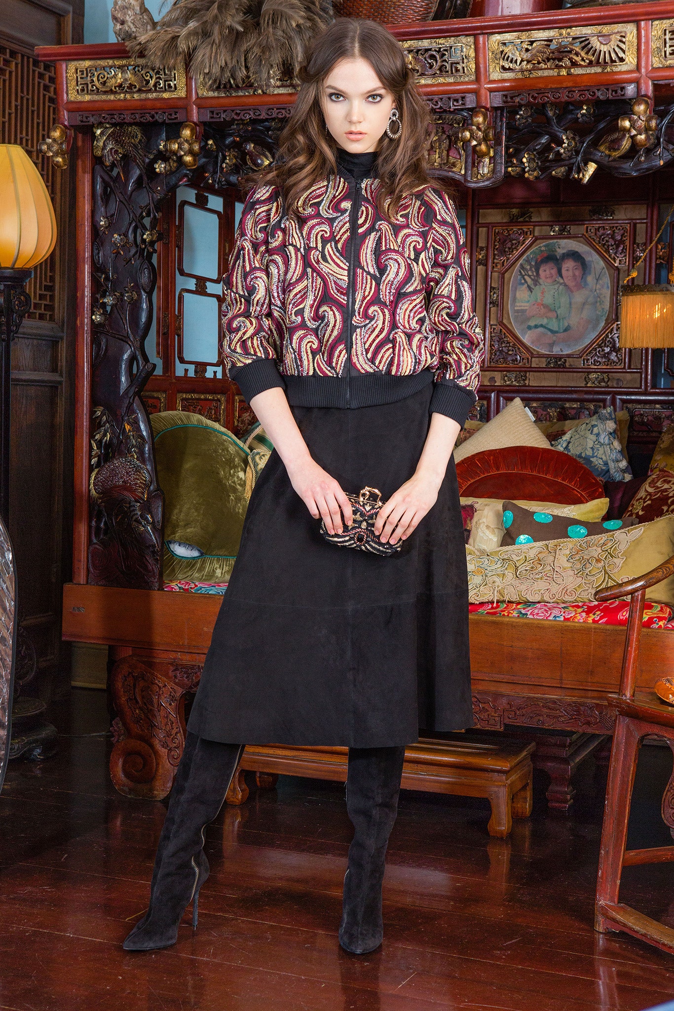multi-colored fitted jacket with black skirt