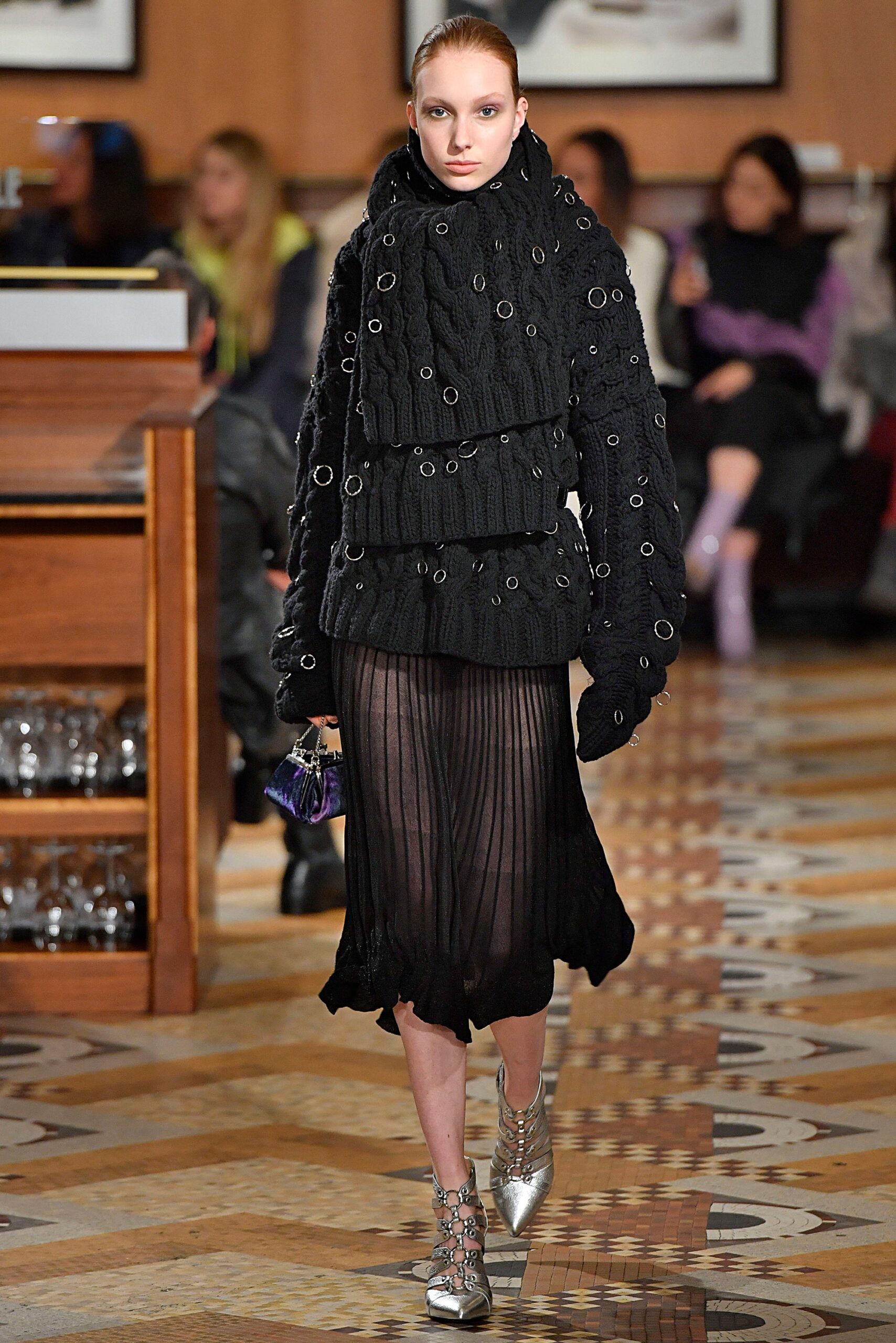 black pleated midi dress with oversized sweater