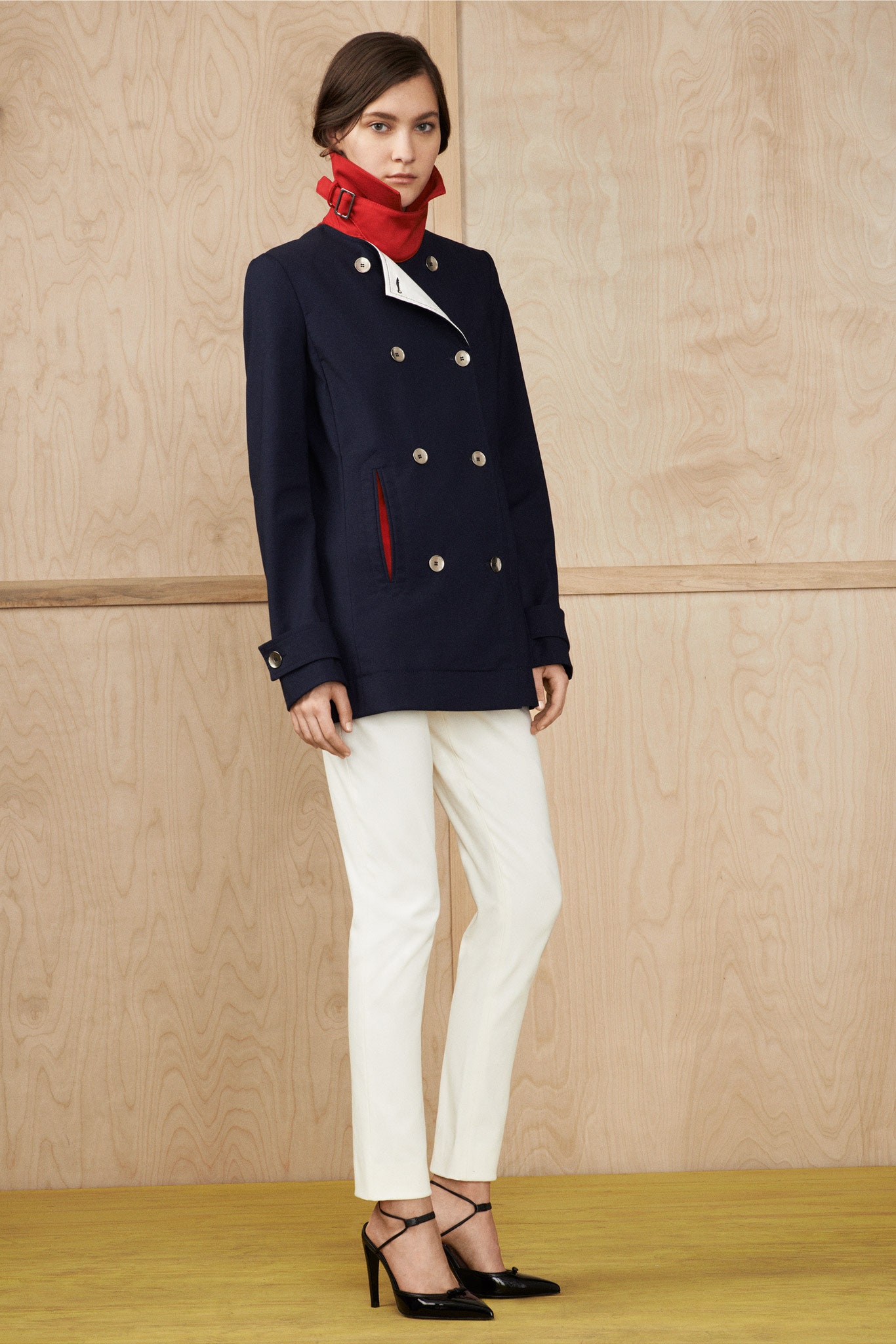 navy tailored jacket with white pants