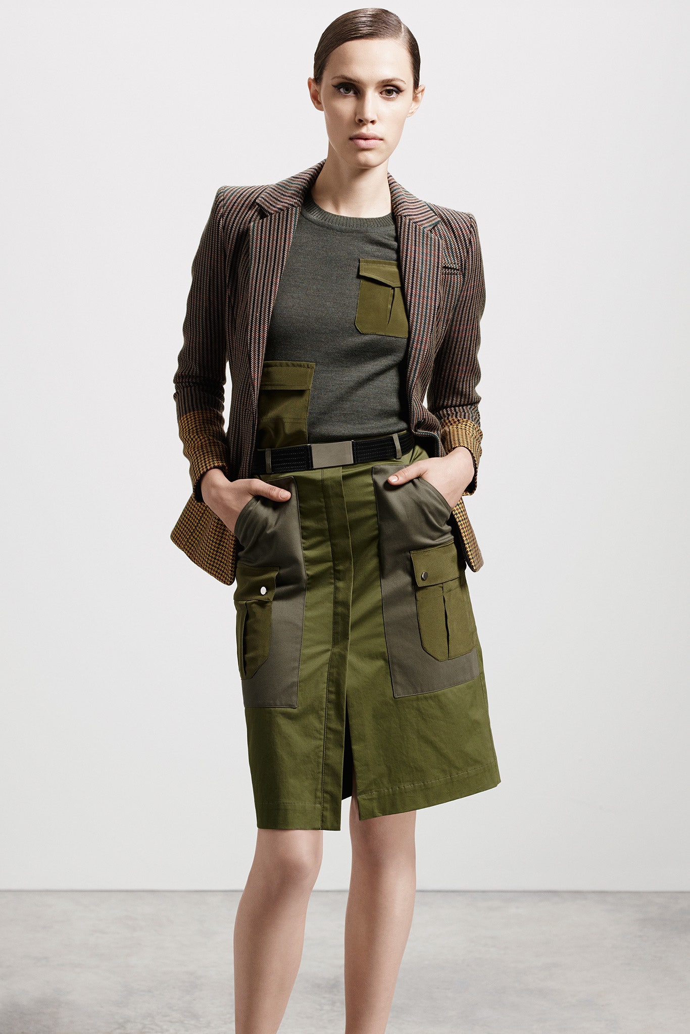 tailored brown striped blazer with green skirt