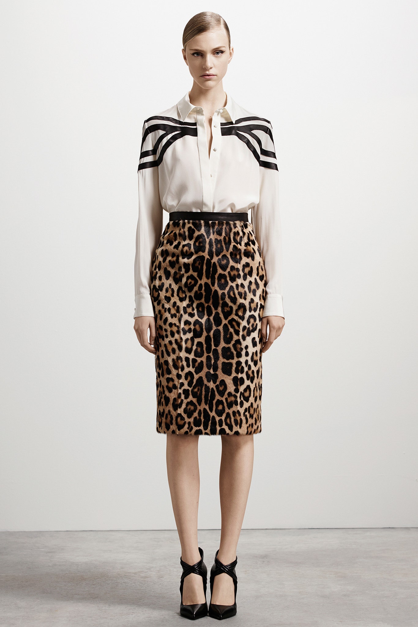 white silk shirt and brown leather skirt