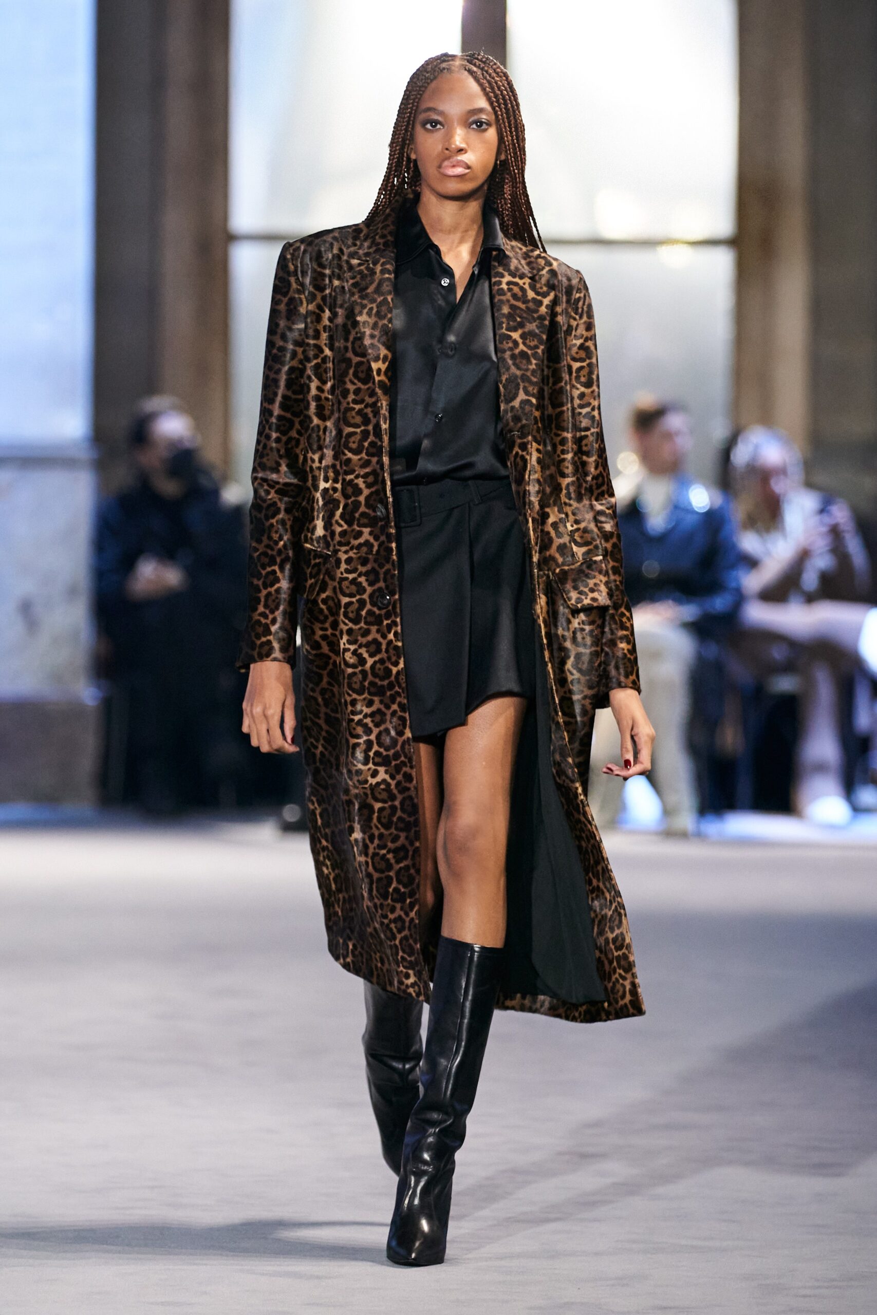 brown animal-print coat with black blouse