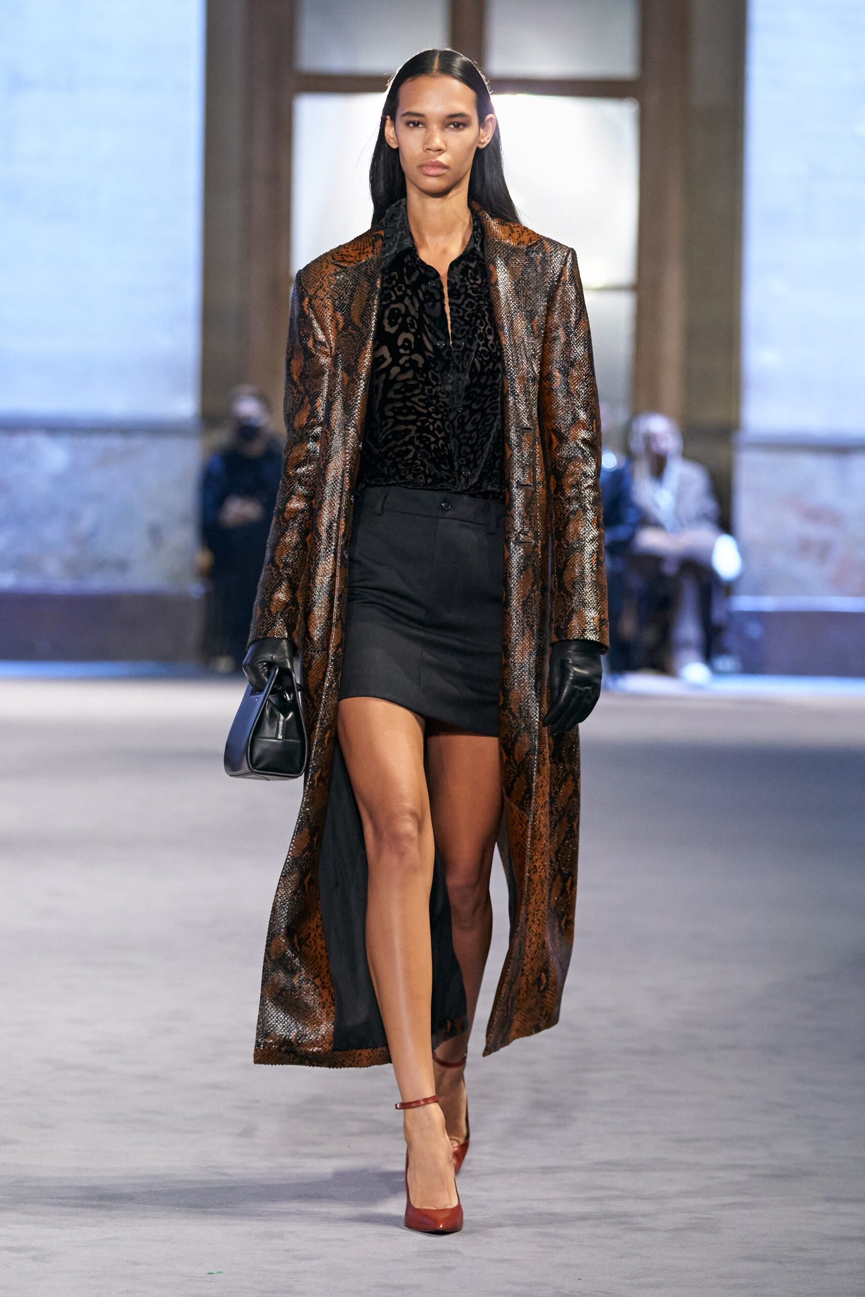 brown printed coat with black blouse