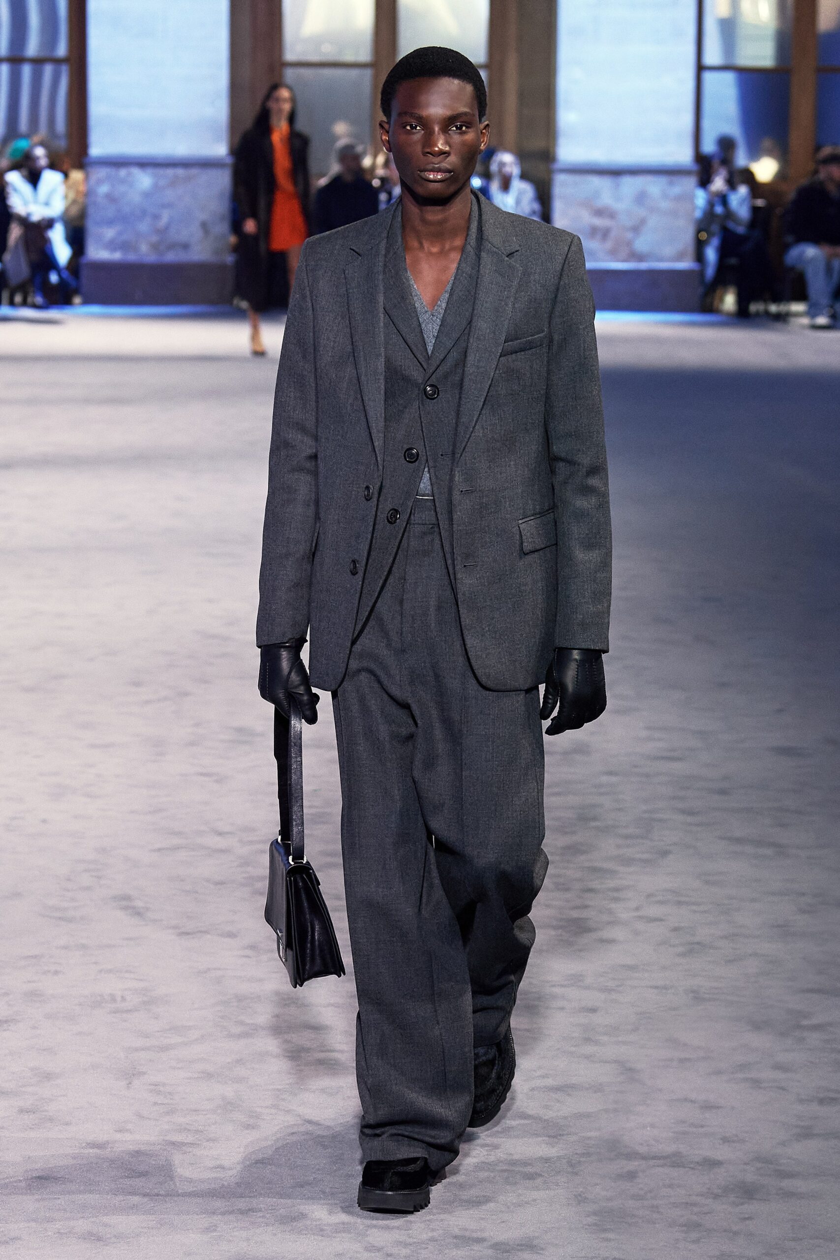 gray tailored suit with blue shirt