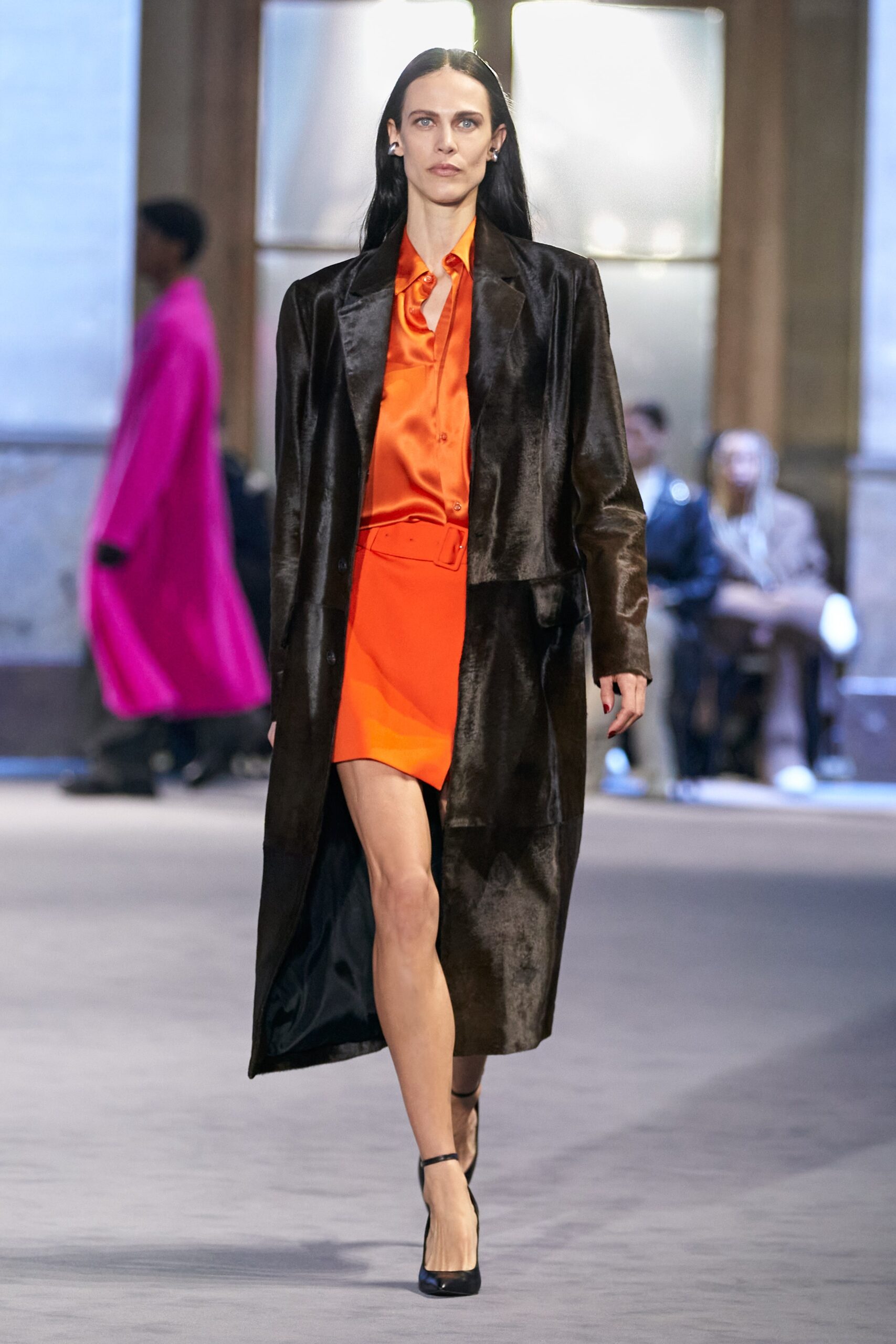 brown silk coat and orange dress