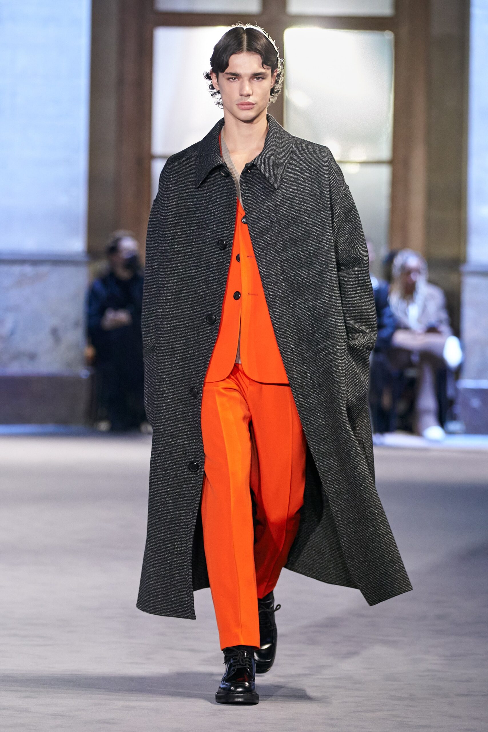 gray oversized coat with orange suit