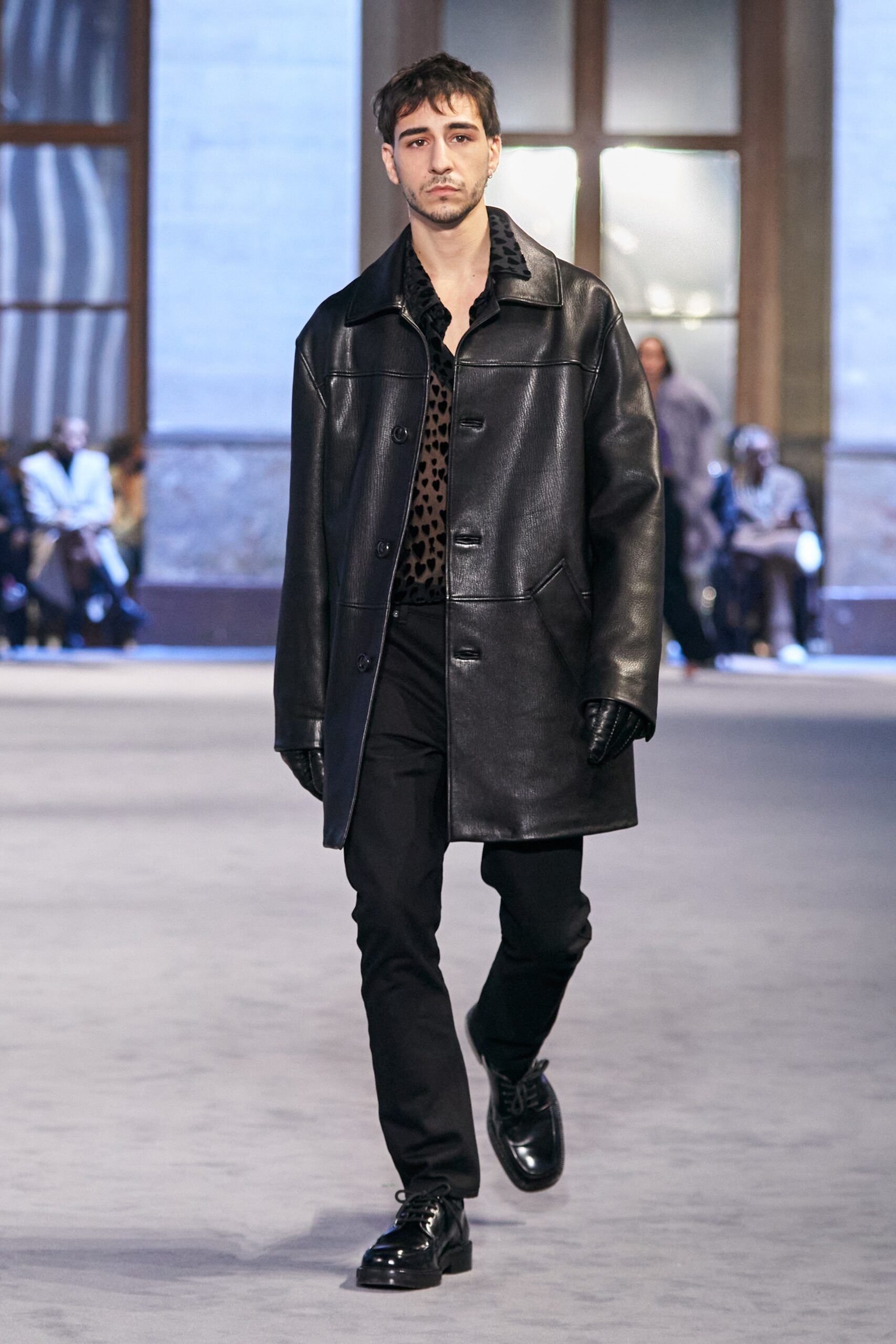 black leather coat with printed shirt