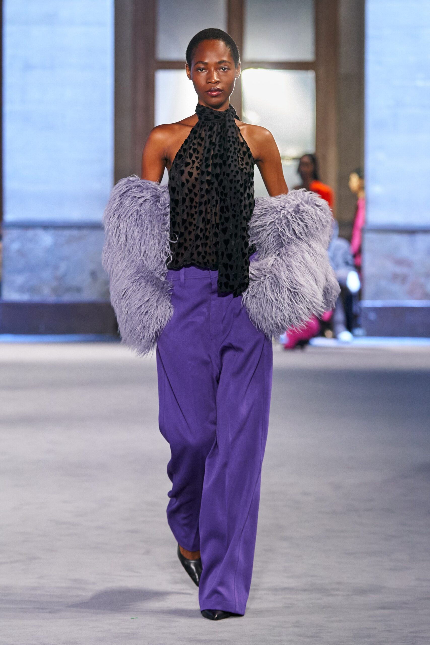 black silk top purple pants gray fur coat