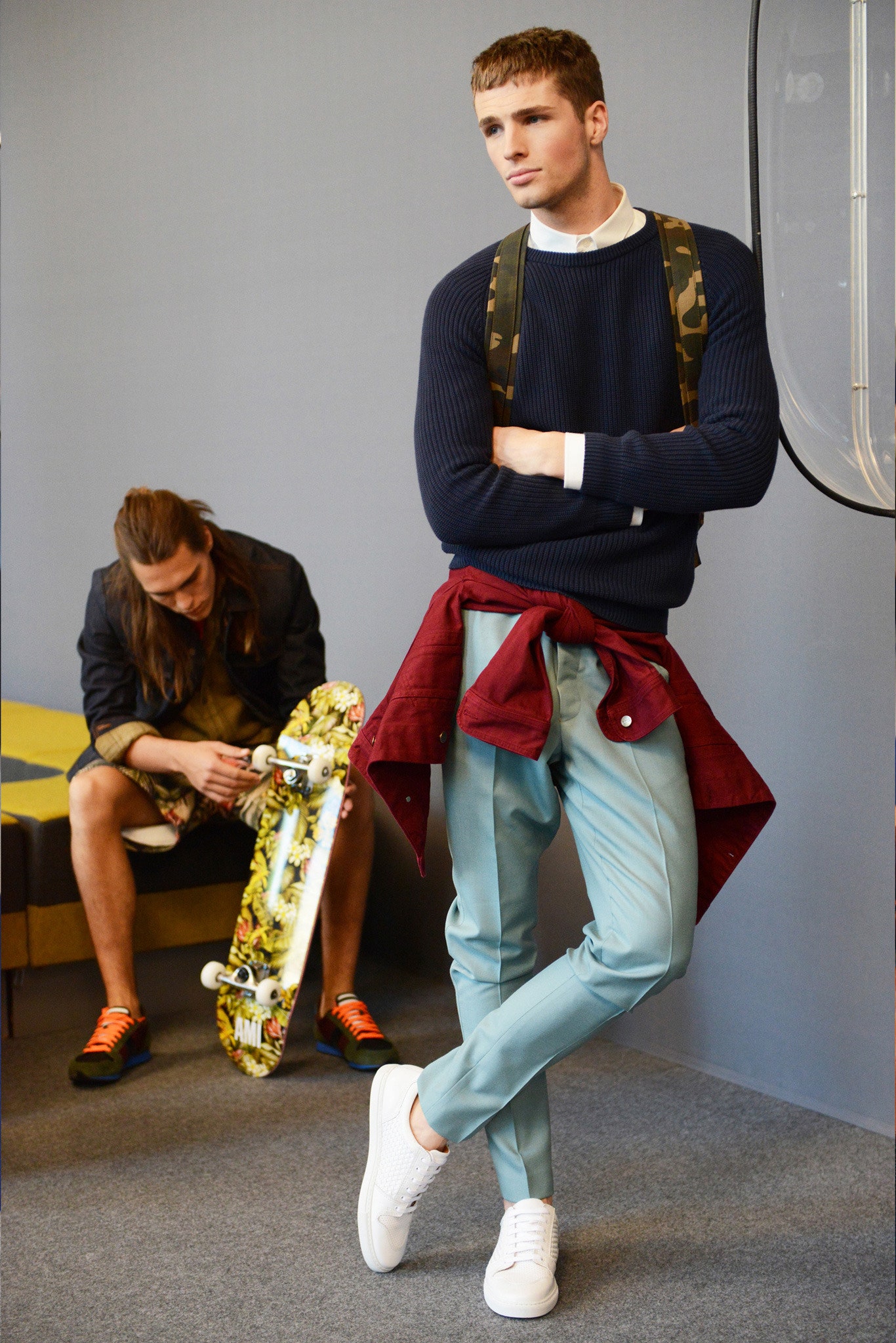 navy sweater with teal pants