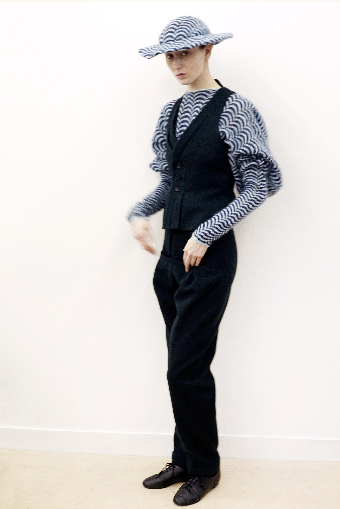 black wool vest with blue top