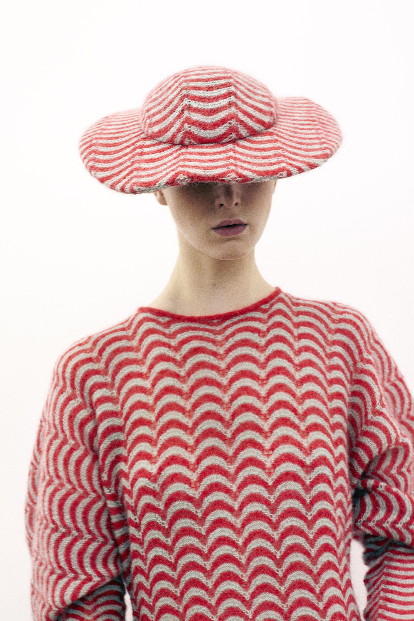 red and white zigzag sweater with hat