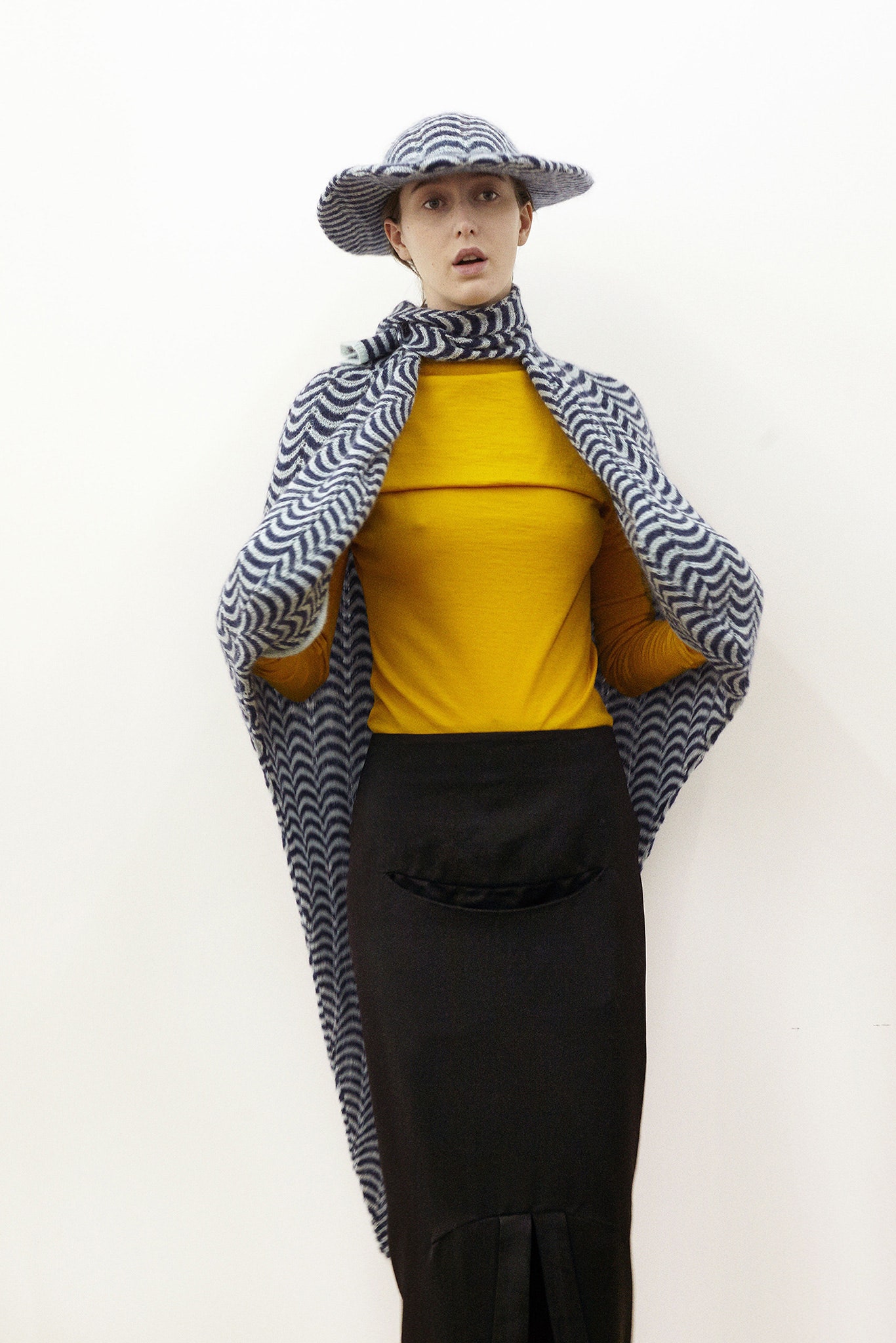 yellow fitted top with layered cape