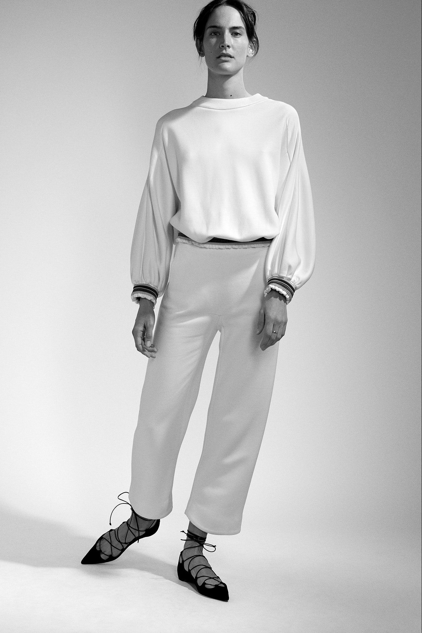 white cotton long-sleeve collared relaxed padded top