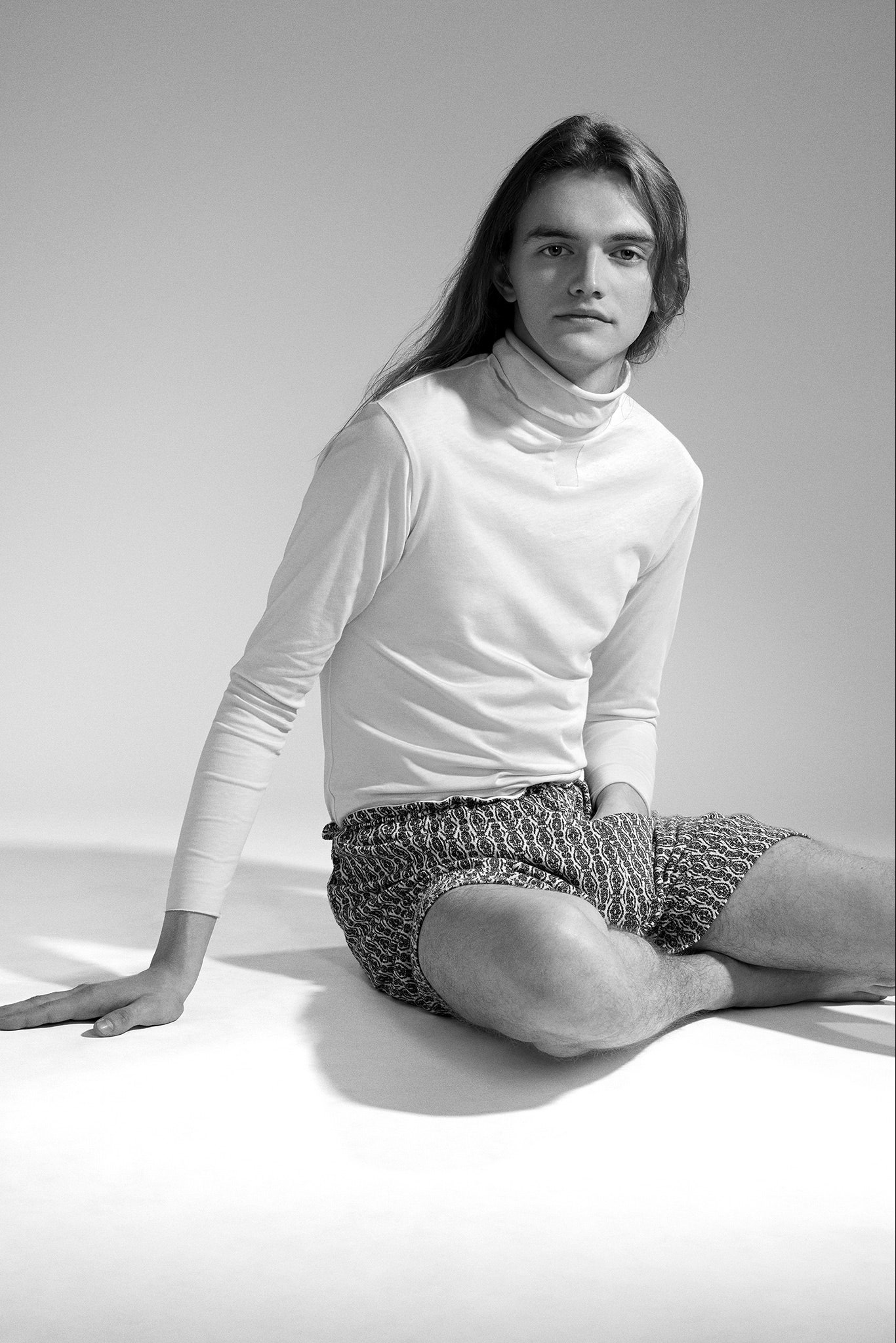 white cotton long-sleeve high-neck fitted top