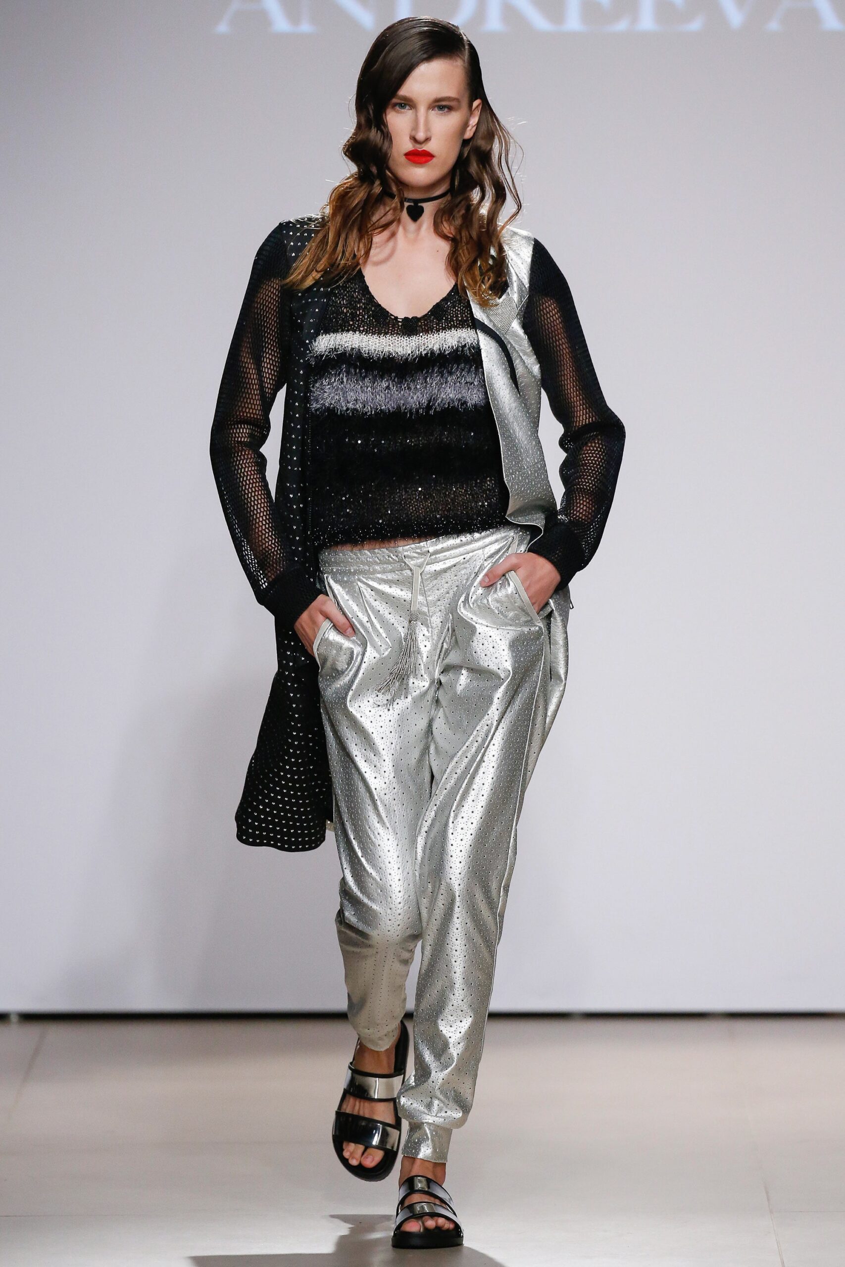 black mesh top with silver pants